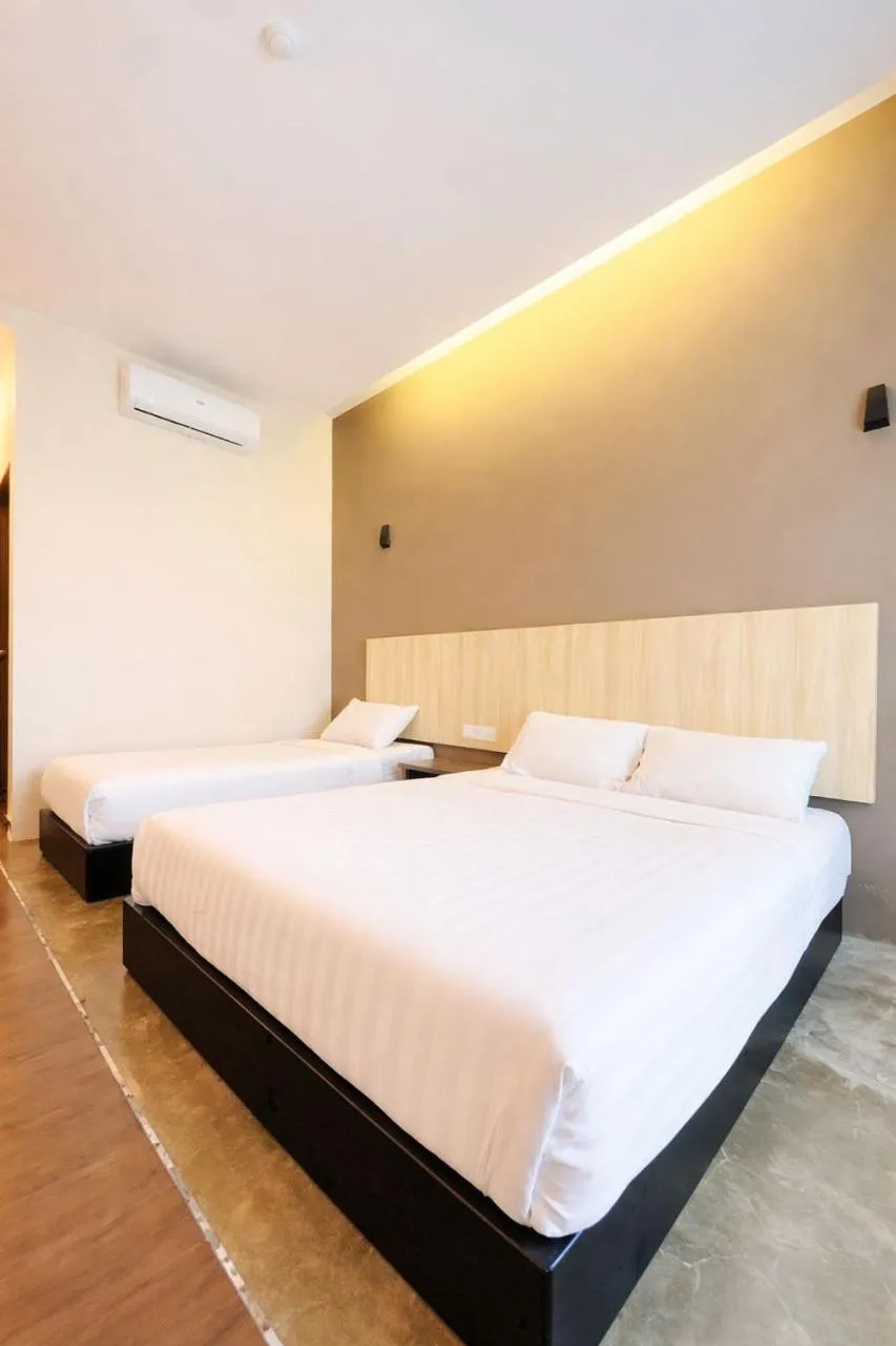 Bed in KARANG TIMUR Hotel