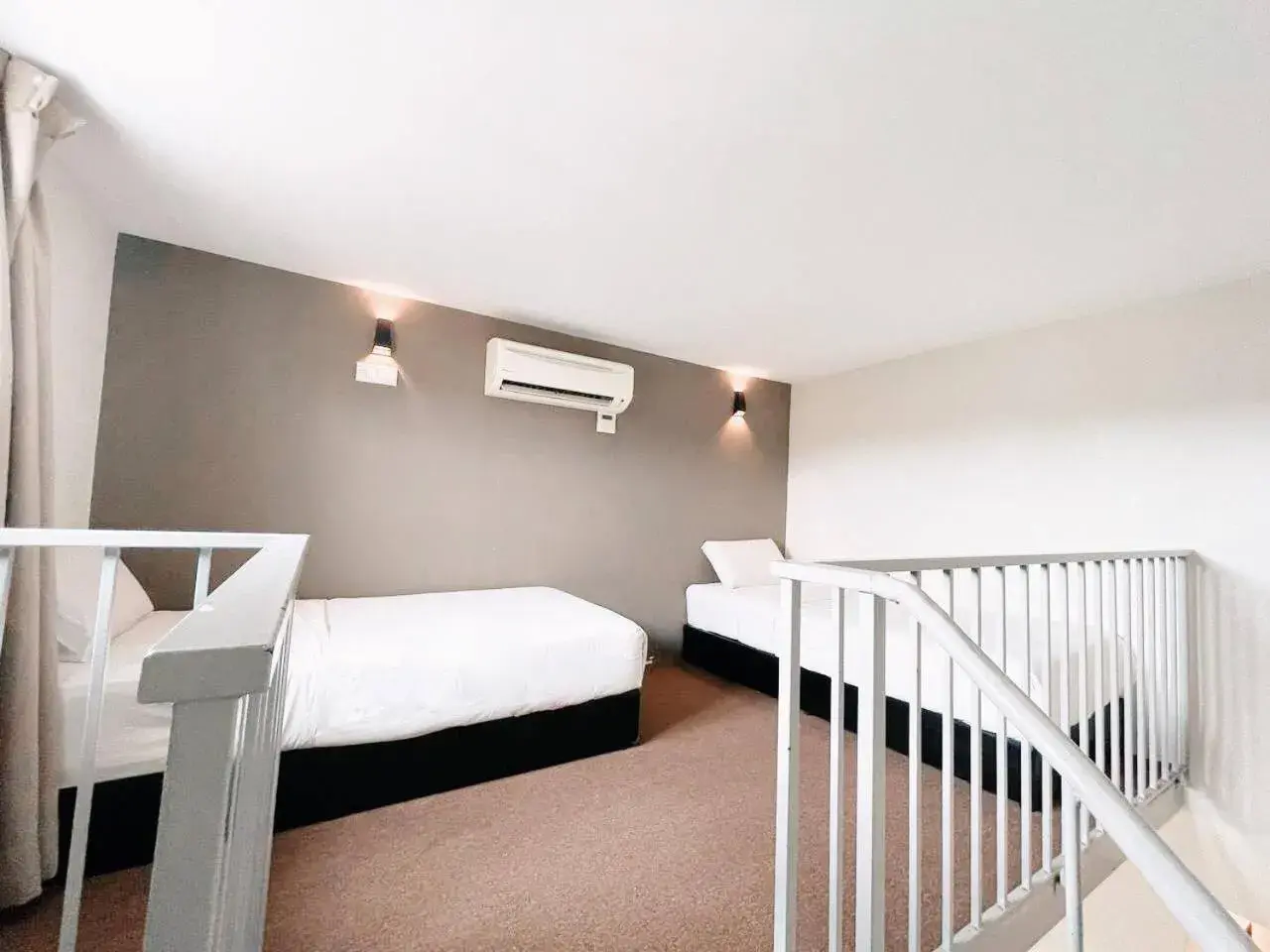 Bed in KARANG TIMUR Hotel Bed in KARANG TIMUR Hotel