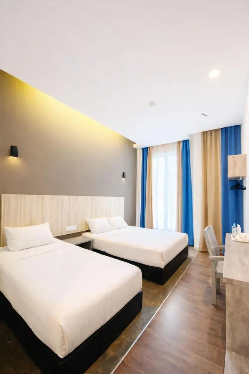 Bed in KARANG TIMUR Hotel Bed in KARANG TIMUR Hotel