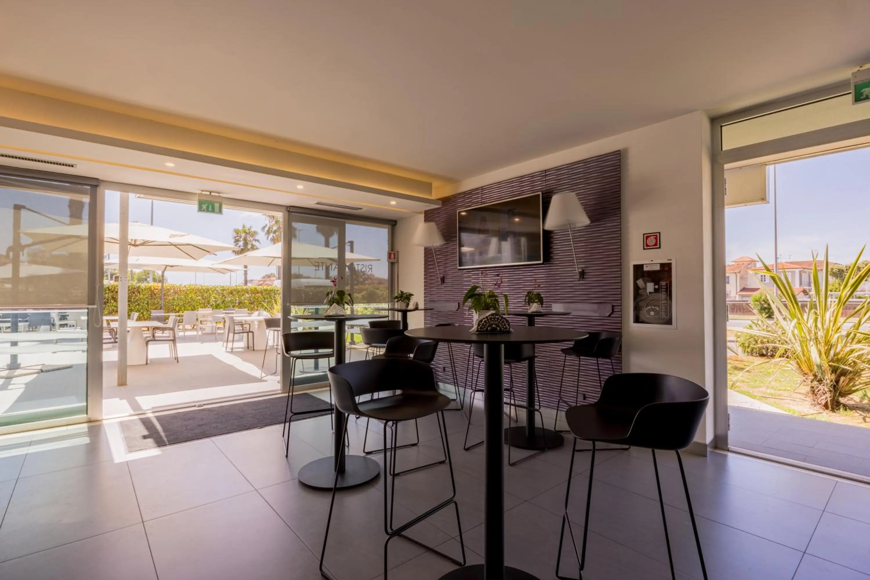 Communal lounge/ TV room in Hotel Viareggio