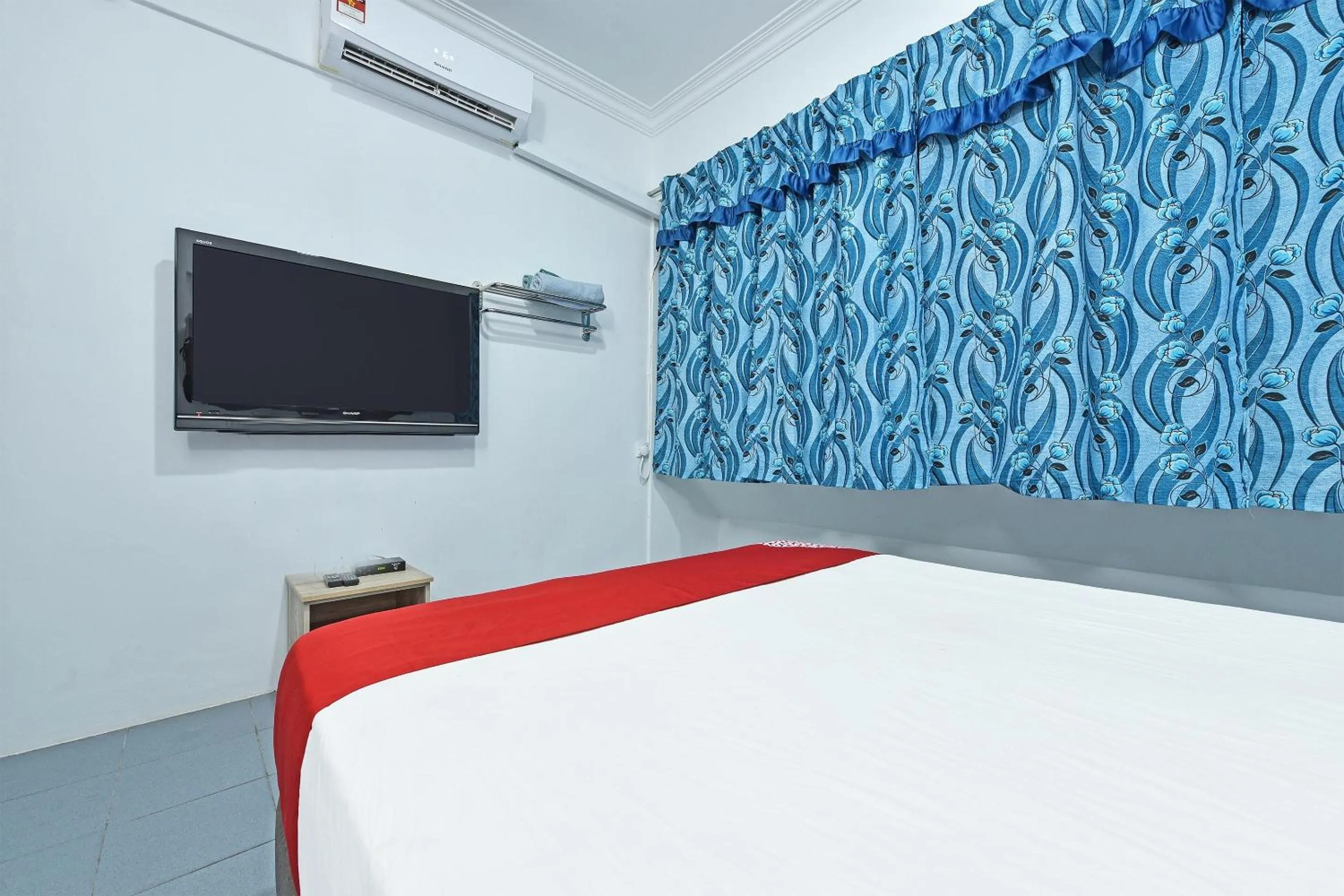 Bedroom in OYO 90544 M&h Hotel