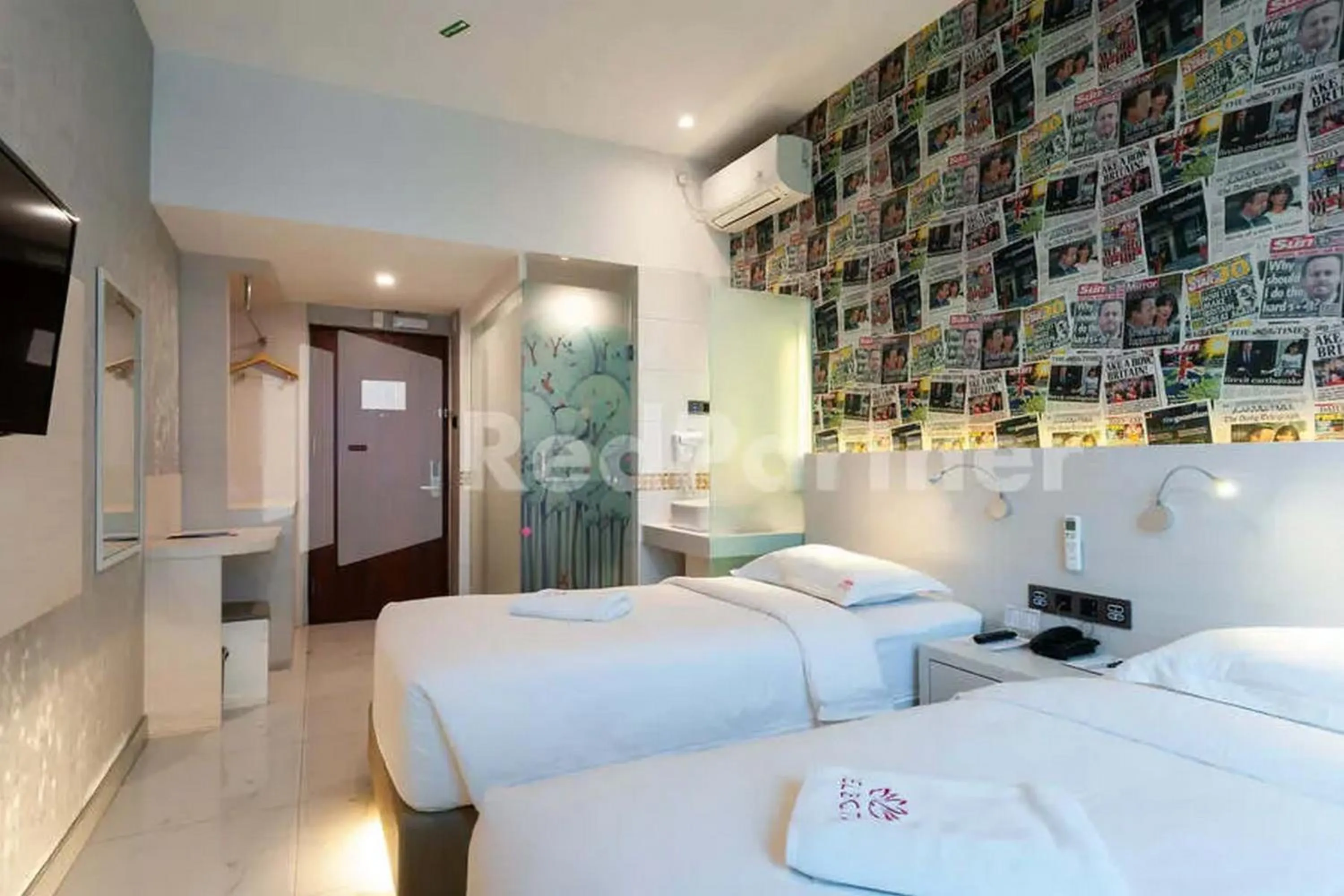 Bedroom, Bed in Selecta Hotel Medan Petisah R Signature Mitra RedDoorz