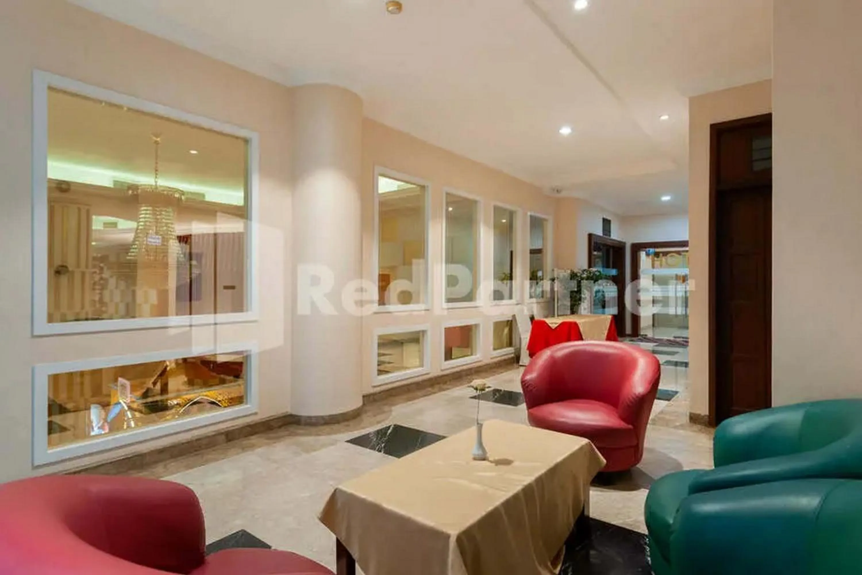 Living room in Selecta Hotel Medan Petisah R Signature Mitra RedDoorz