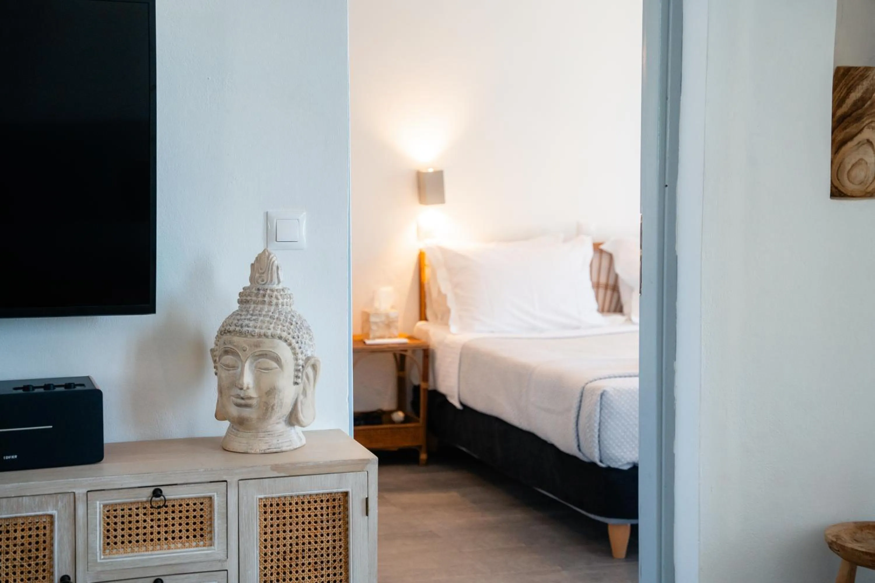 Bed in Divino Suites