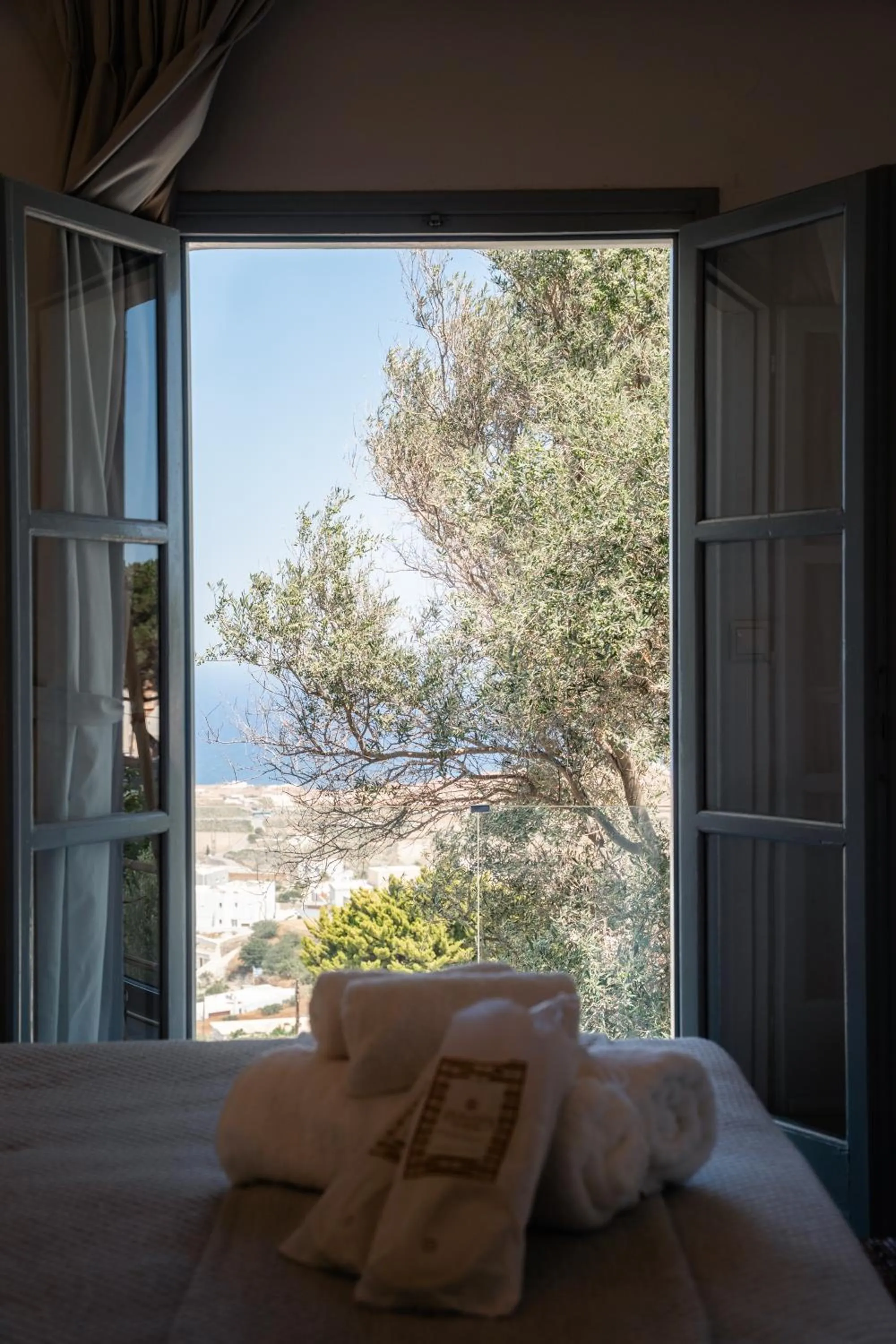 Bed in Divino Suites