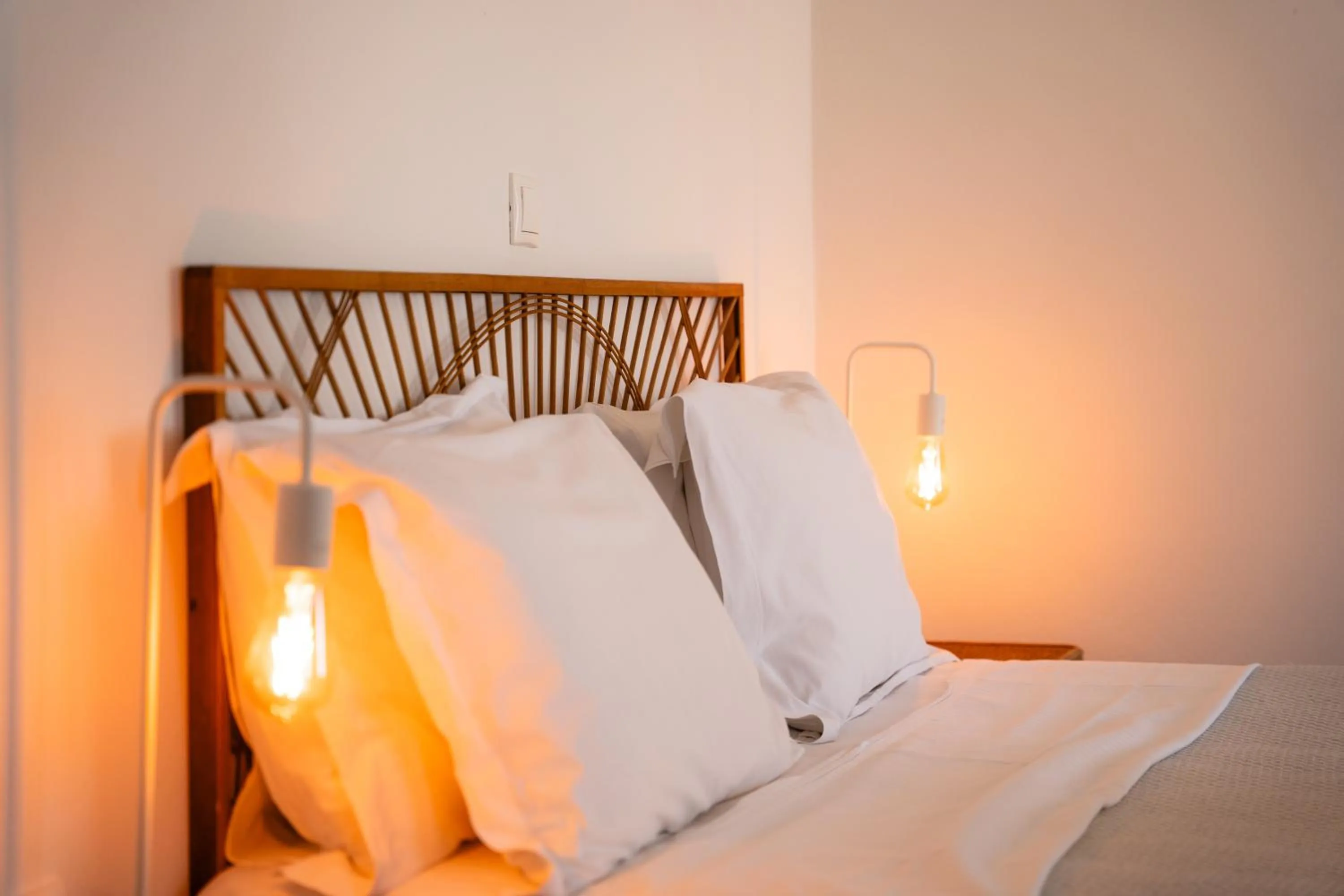 Bed in Divino Suites