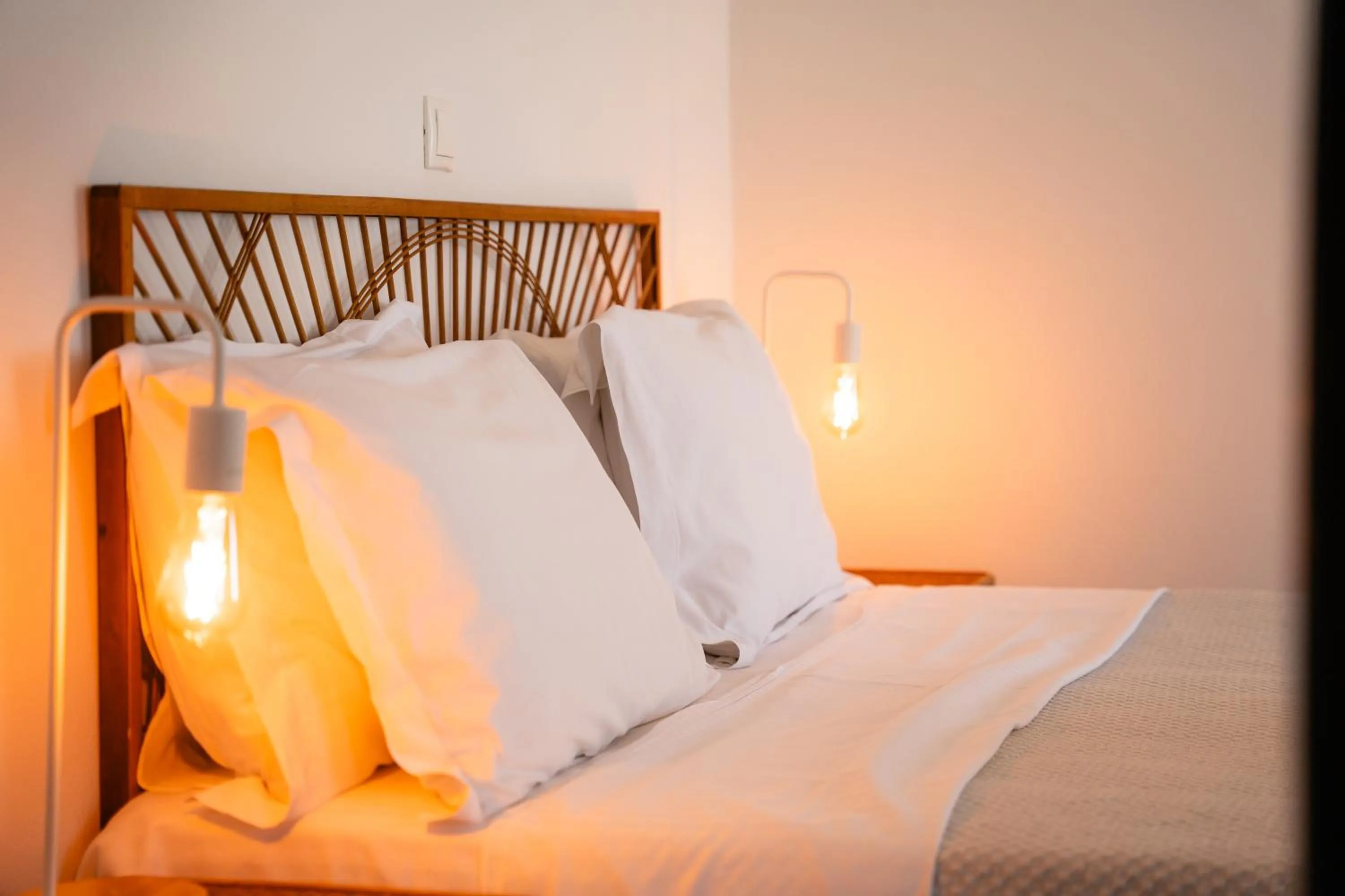 Bed in Divino Suites