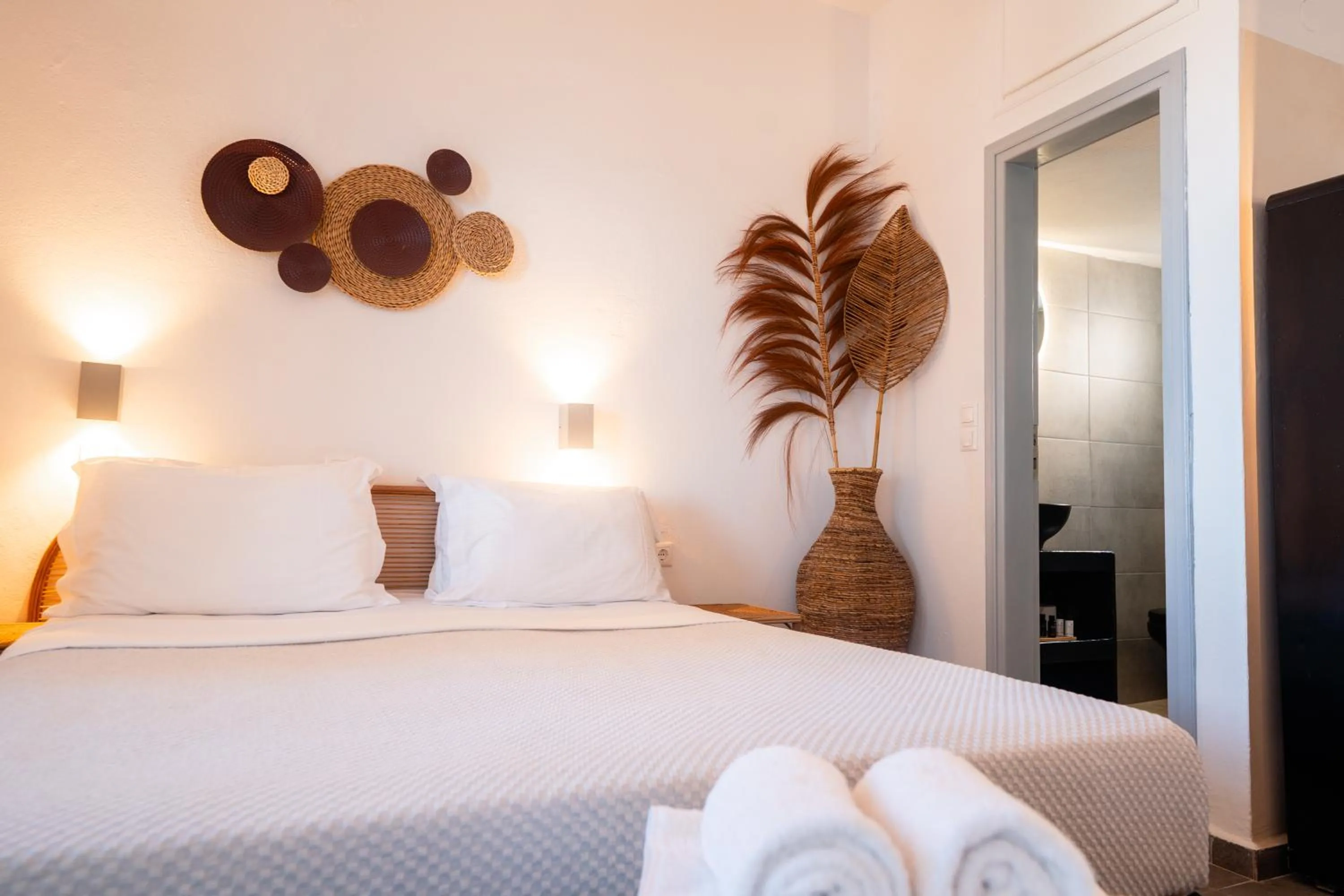 Bed in Divino Suites