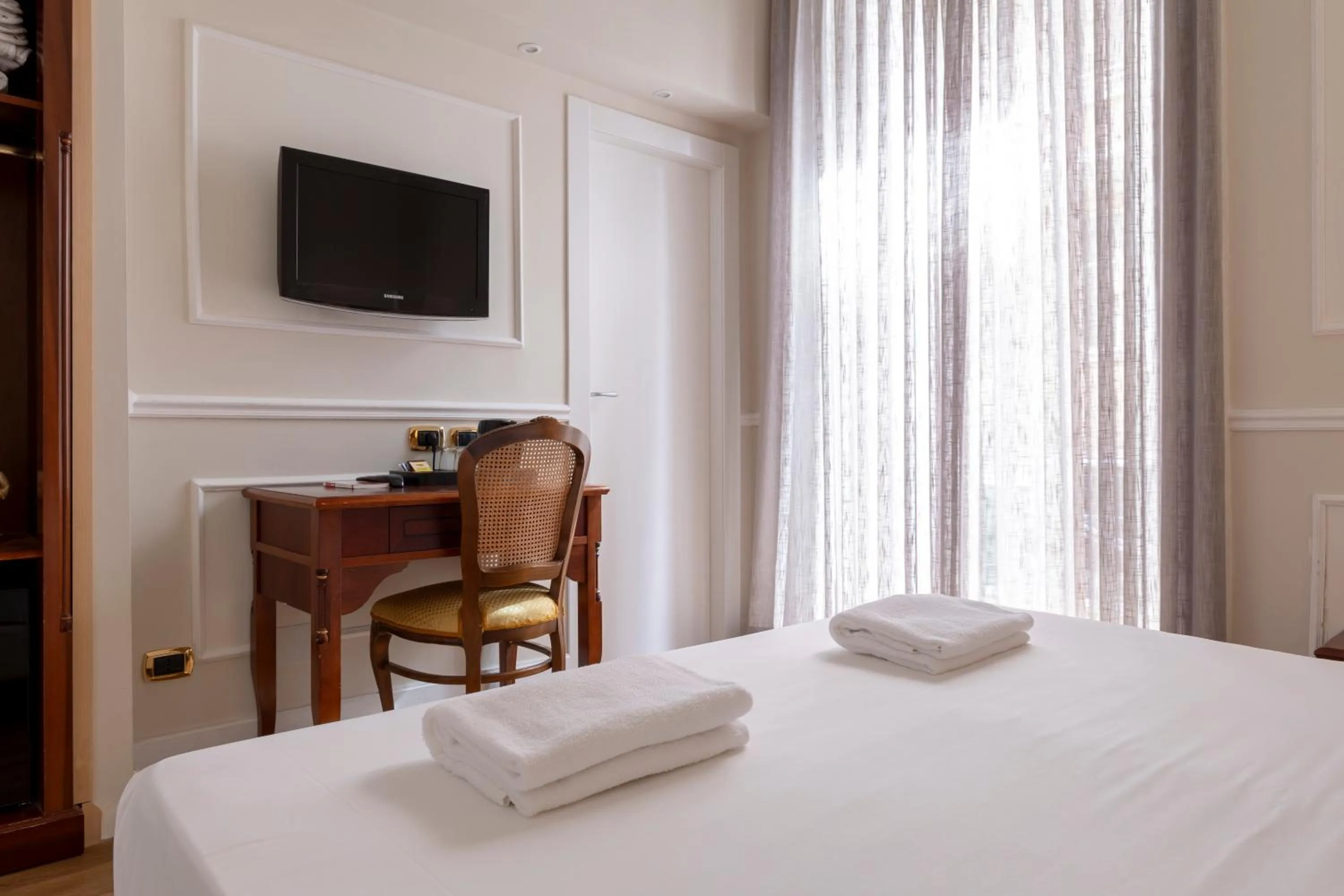 Bed in Napolit'amo Hotel Principe