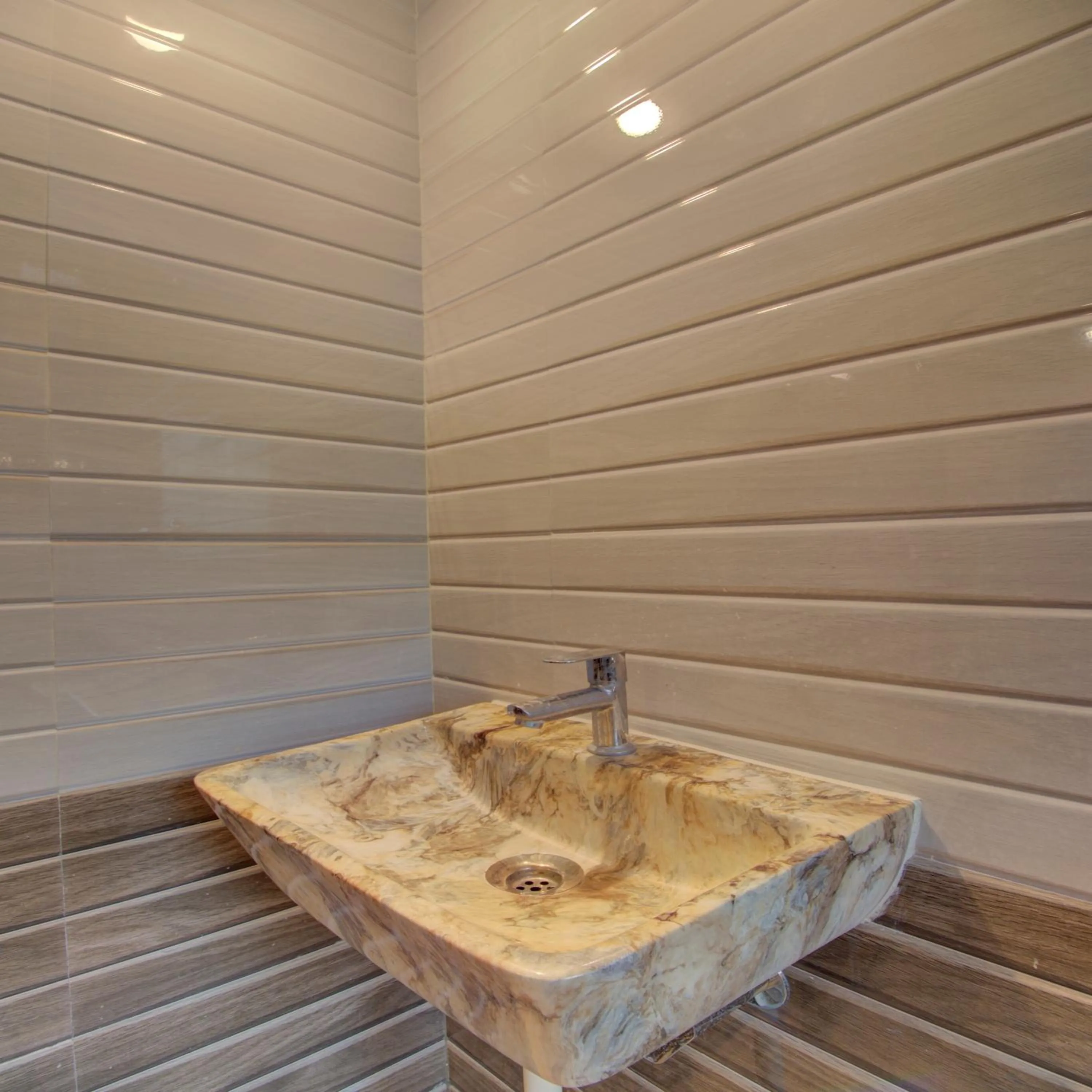 Bathroom in Hotel Snehaprabha - Near to Nagaon Beach Alibaug