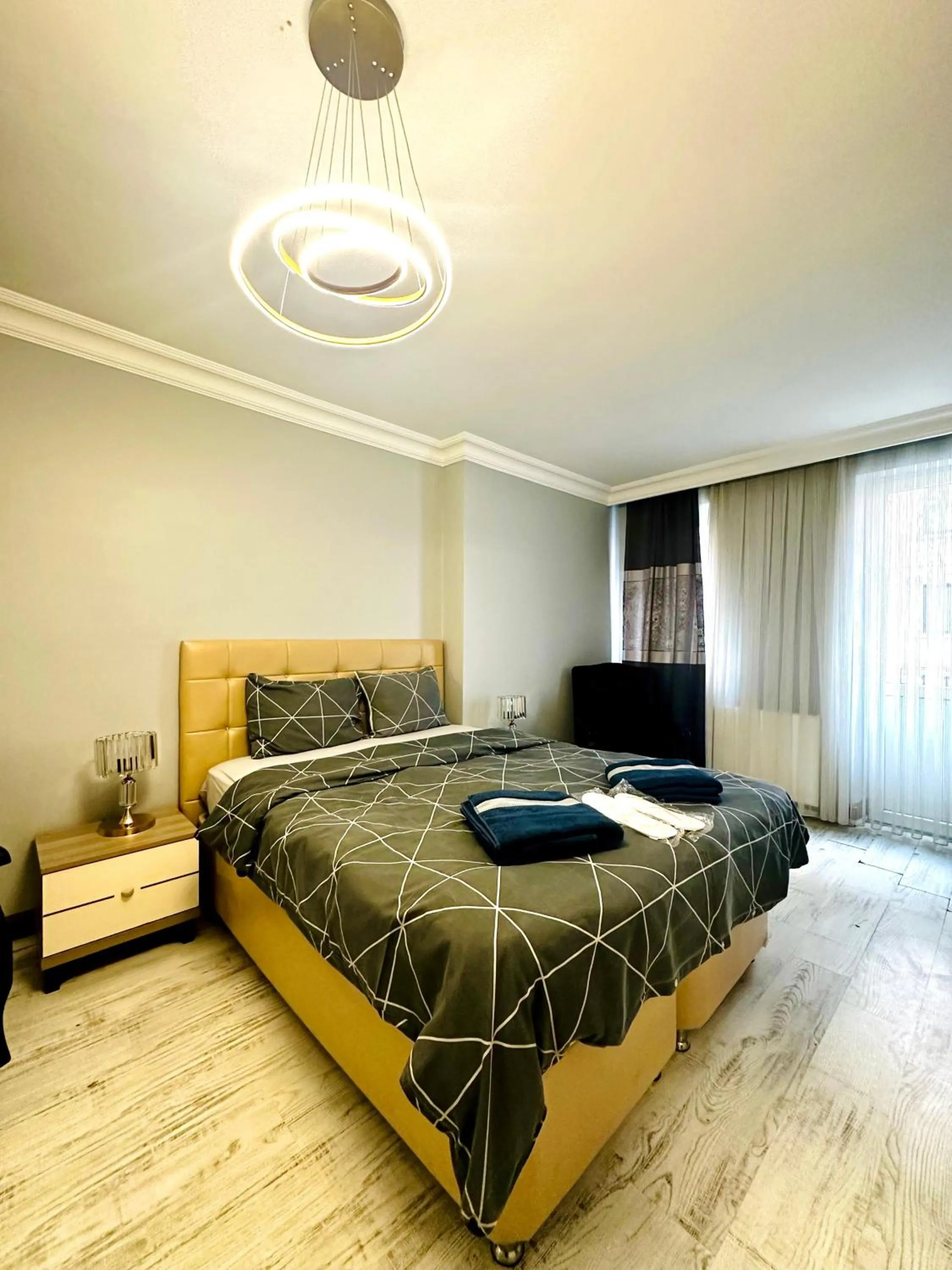 Bed in Blueway Hotel Residence