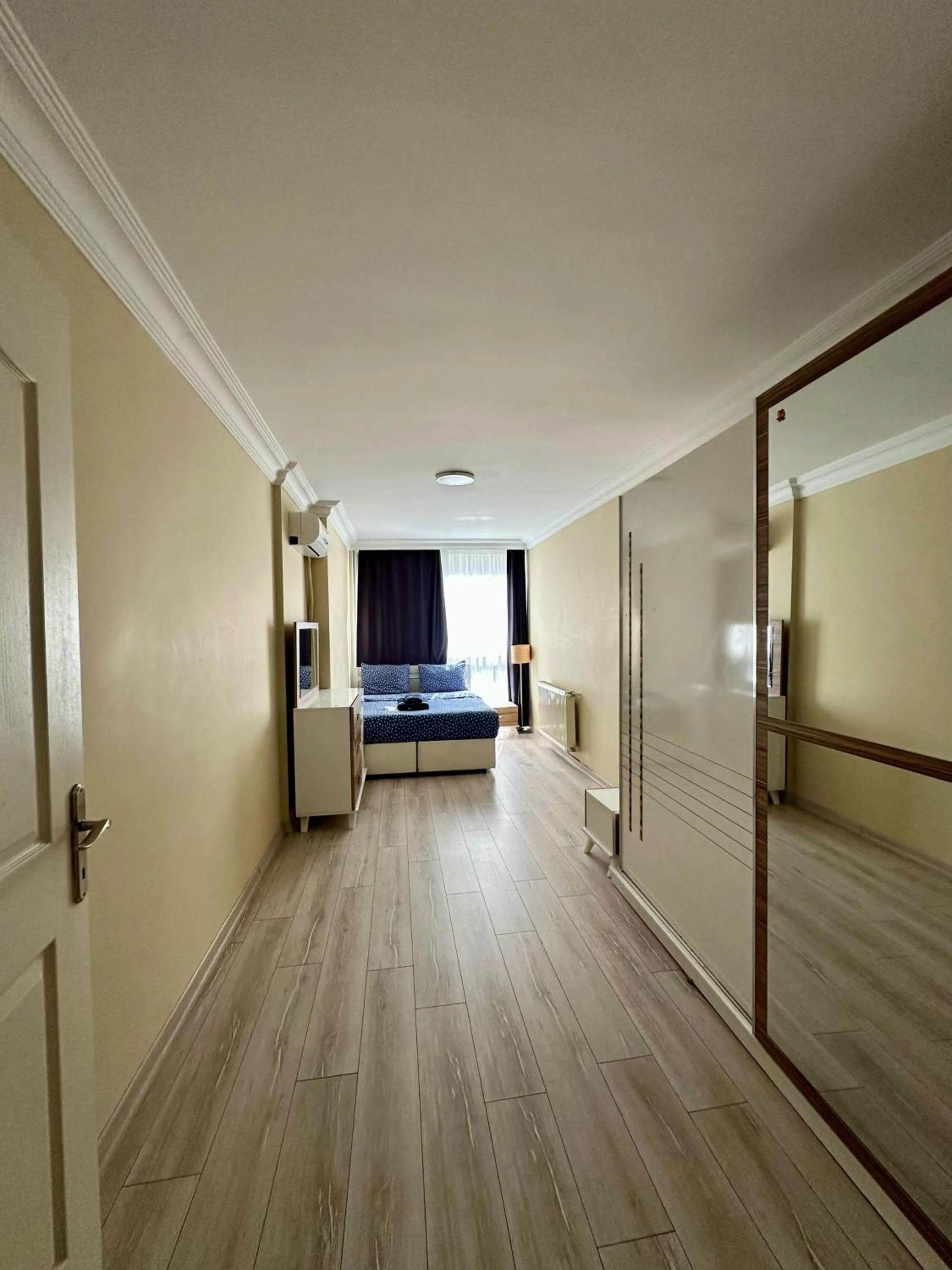 Bed in Blueway Hotel Residence