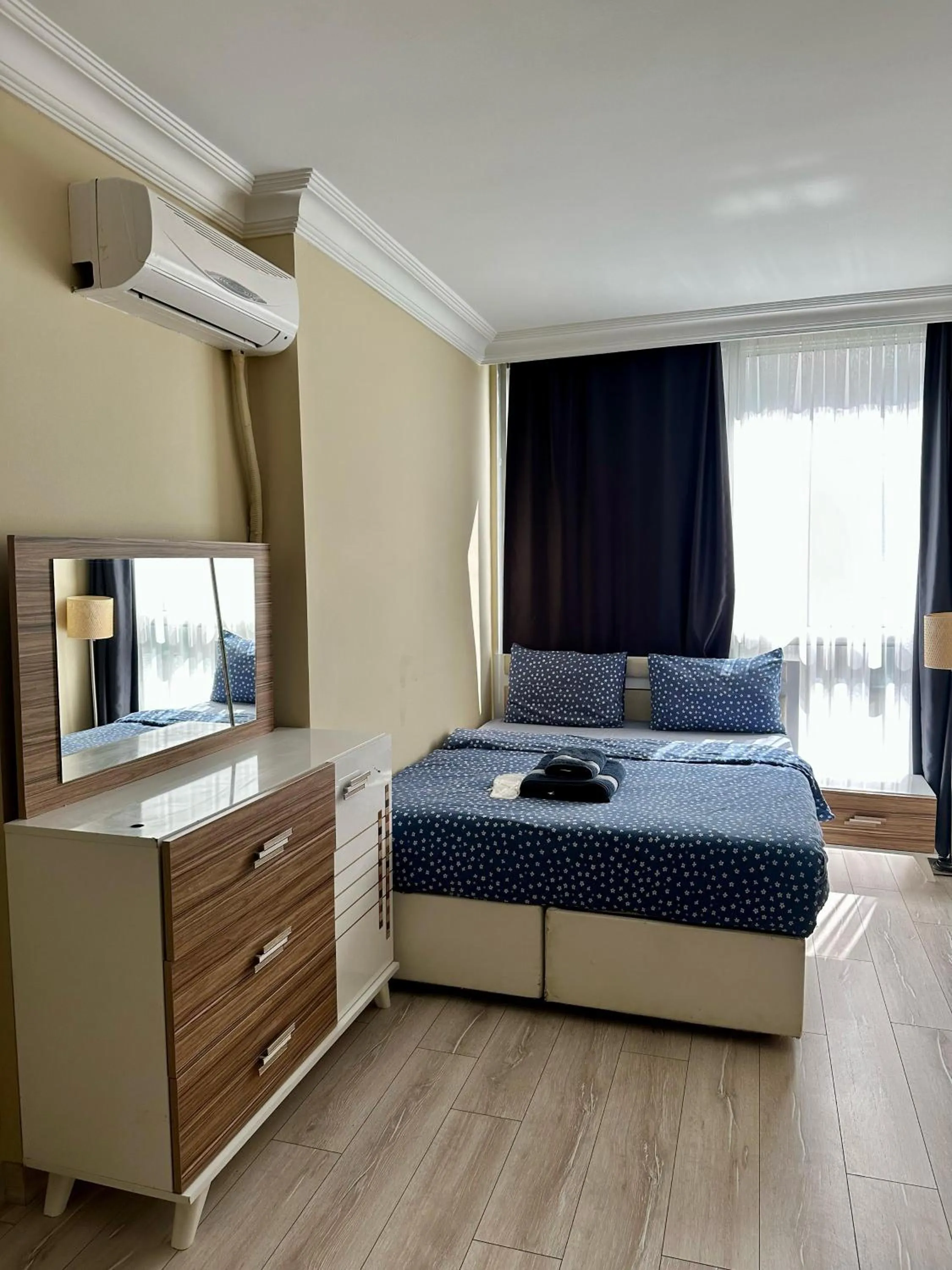 Bed in Blueway Hotel Residence