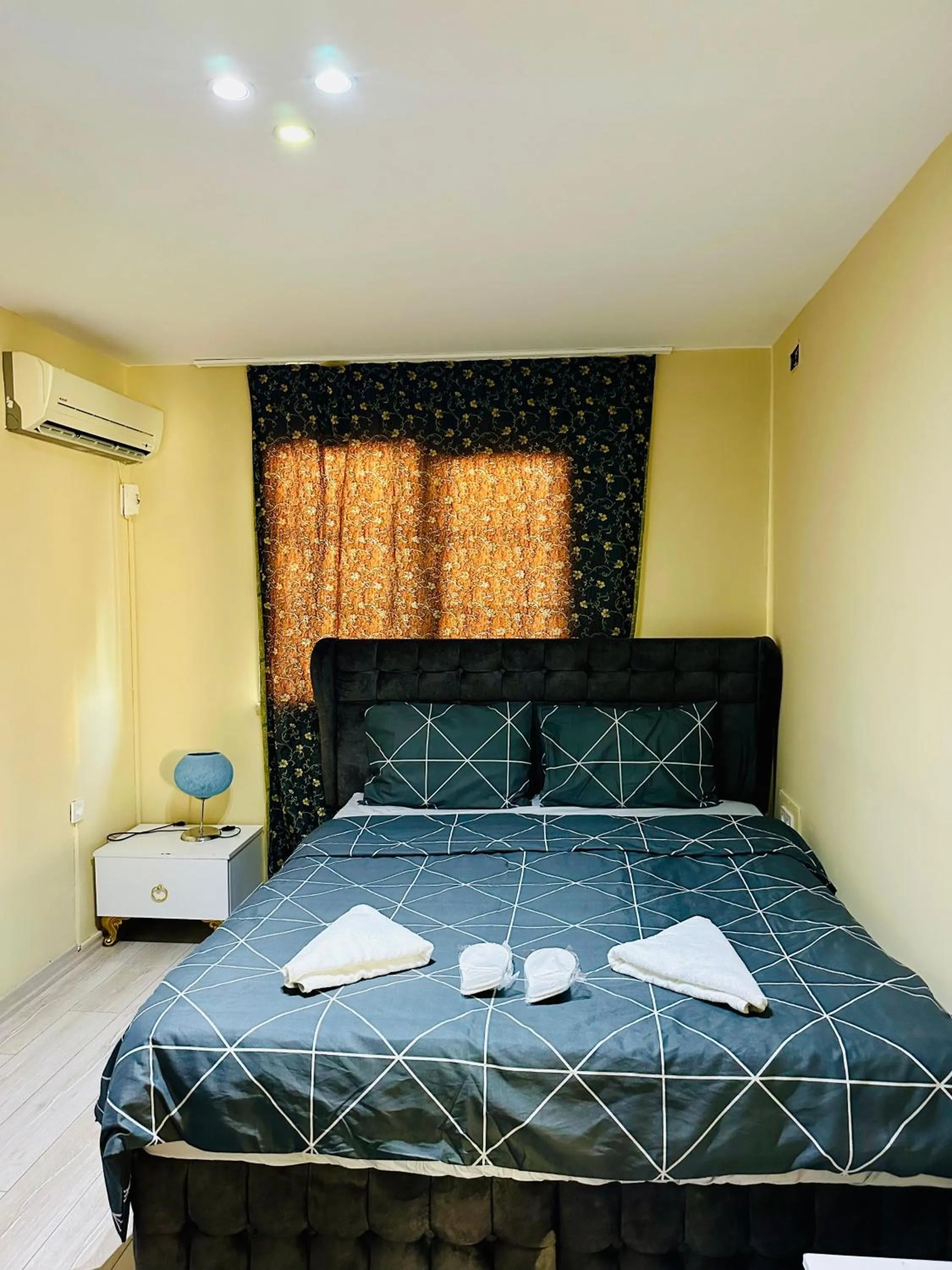 Bed in Blueway Hotel Residence