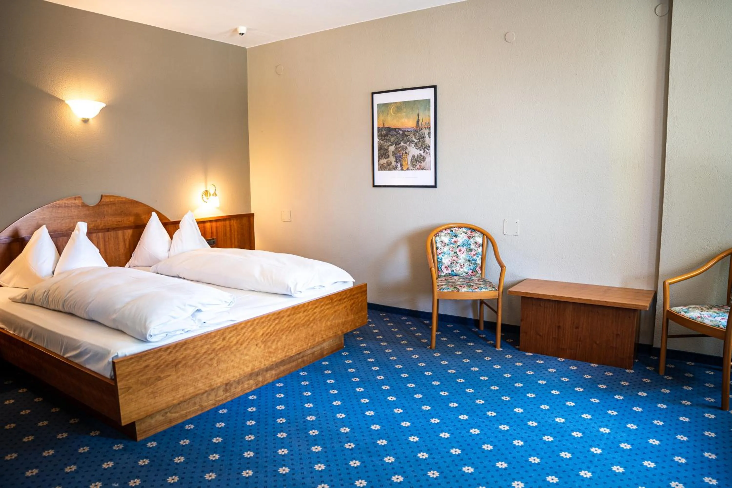 Bed in PanoramaHotel Penegal