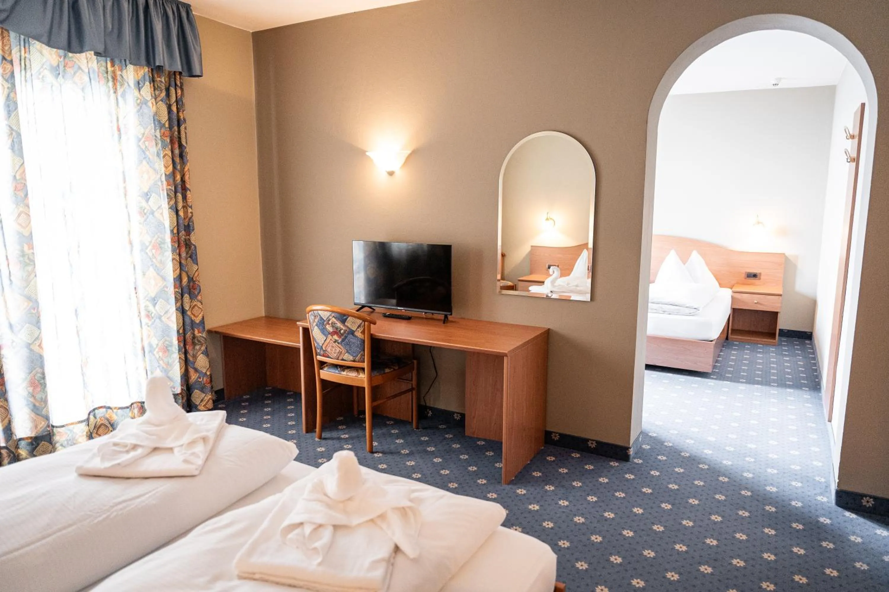 Bedroom in PanoramaHotel Penegal