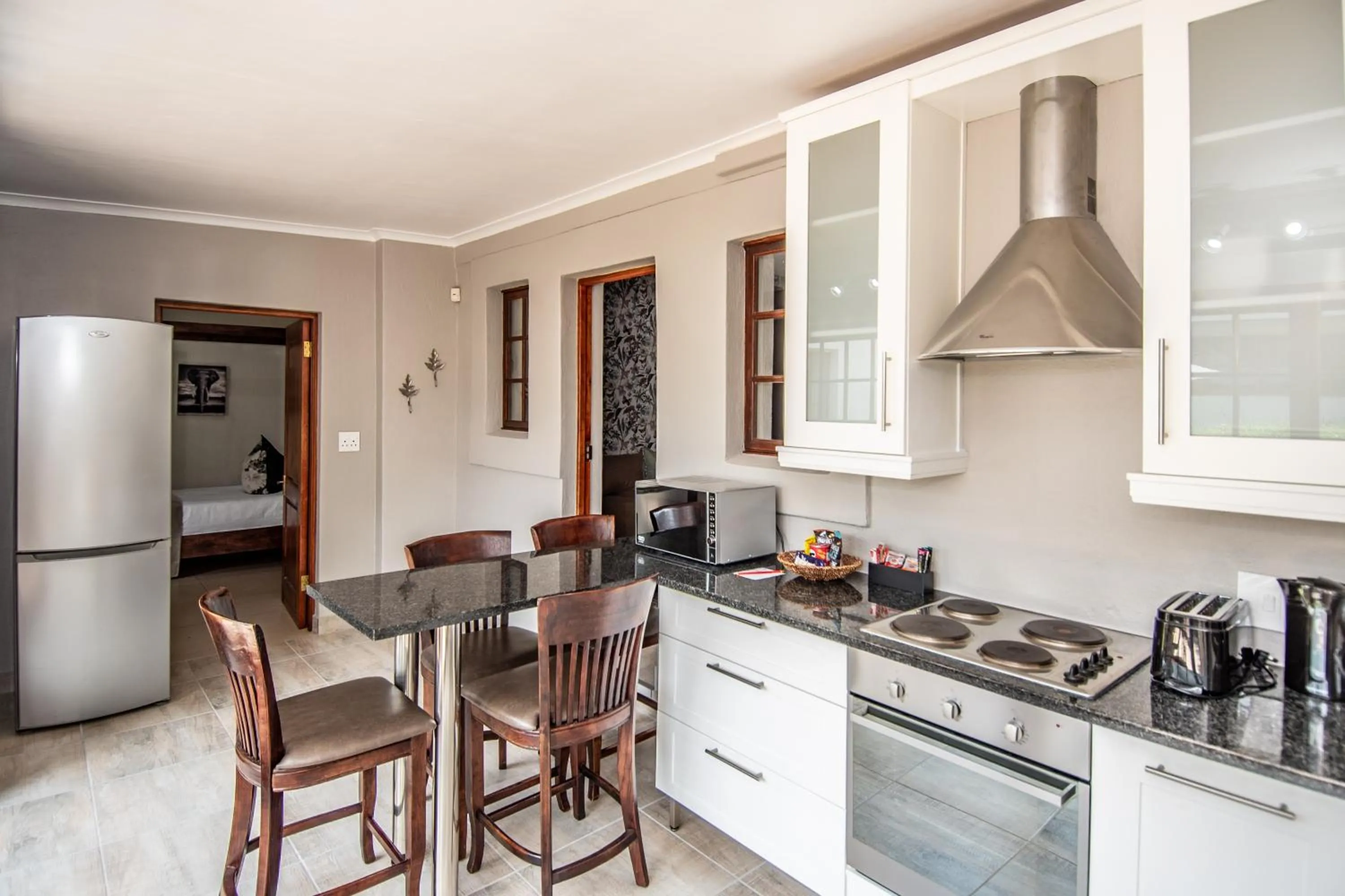 Kitchen or kitchenette in Nut Grove Boutique Hotel