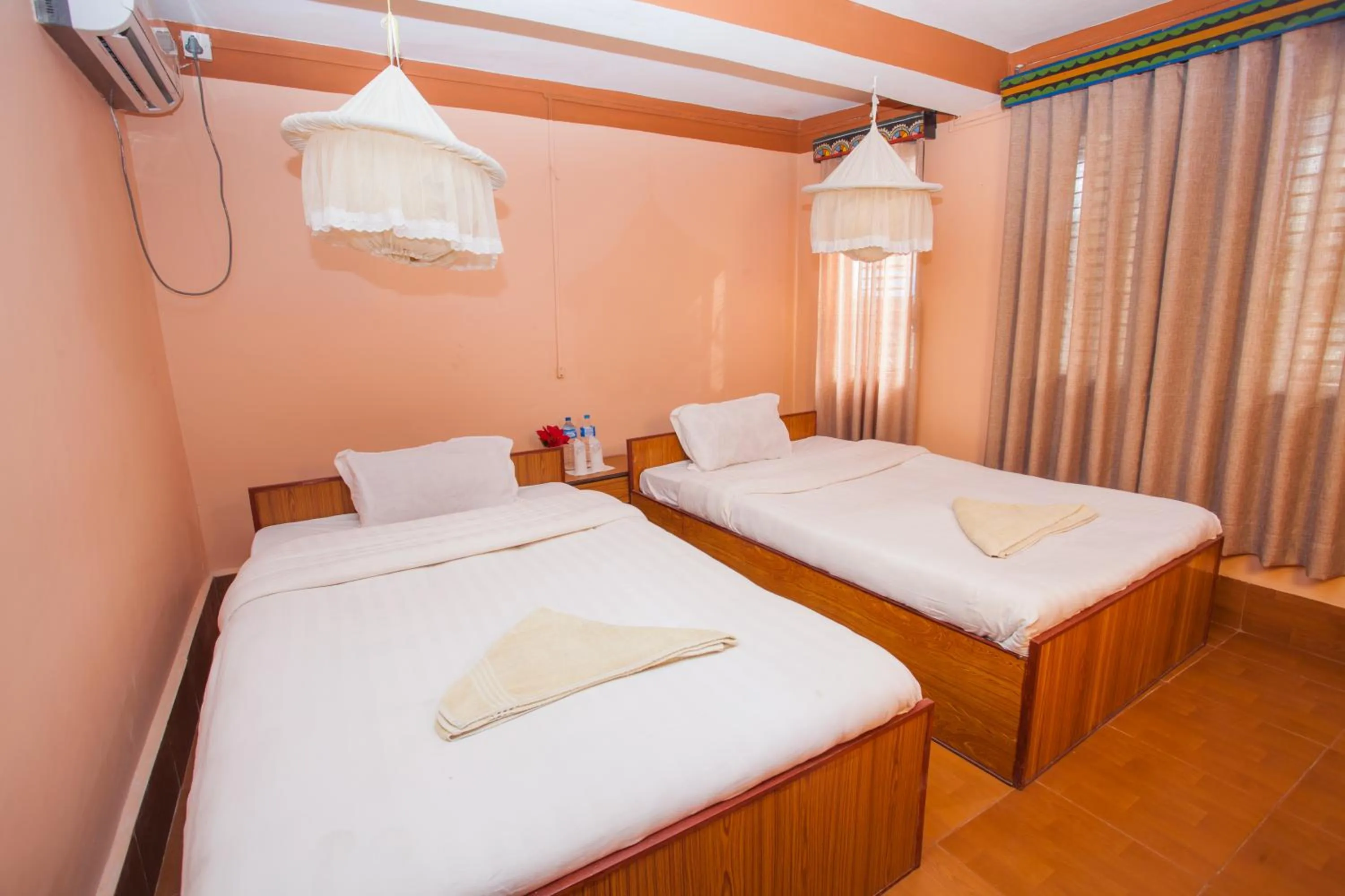 Bed in Chitwan Tiger Camp