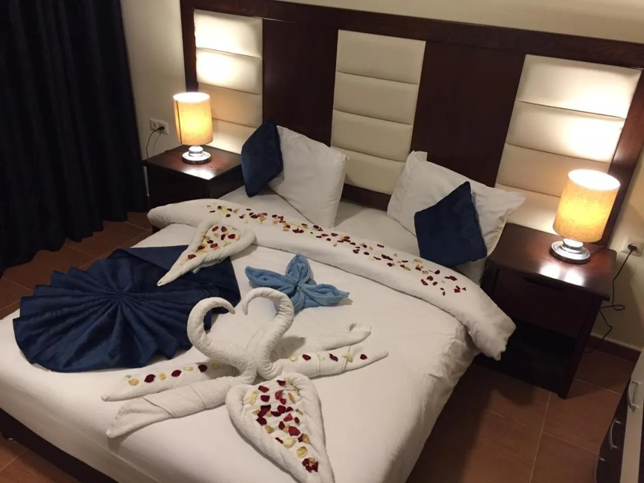 Bed in Uptown Hotel Apartment