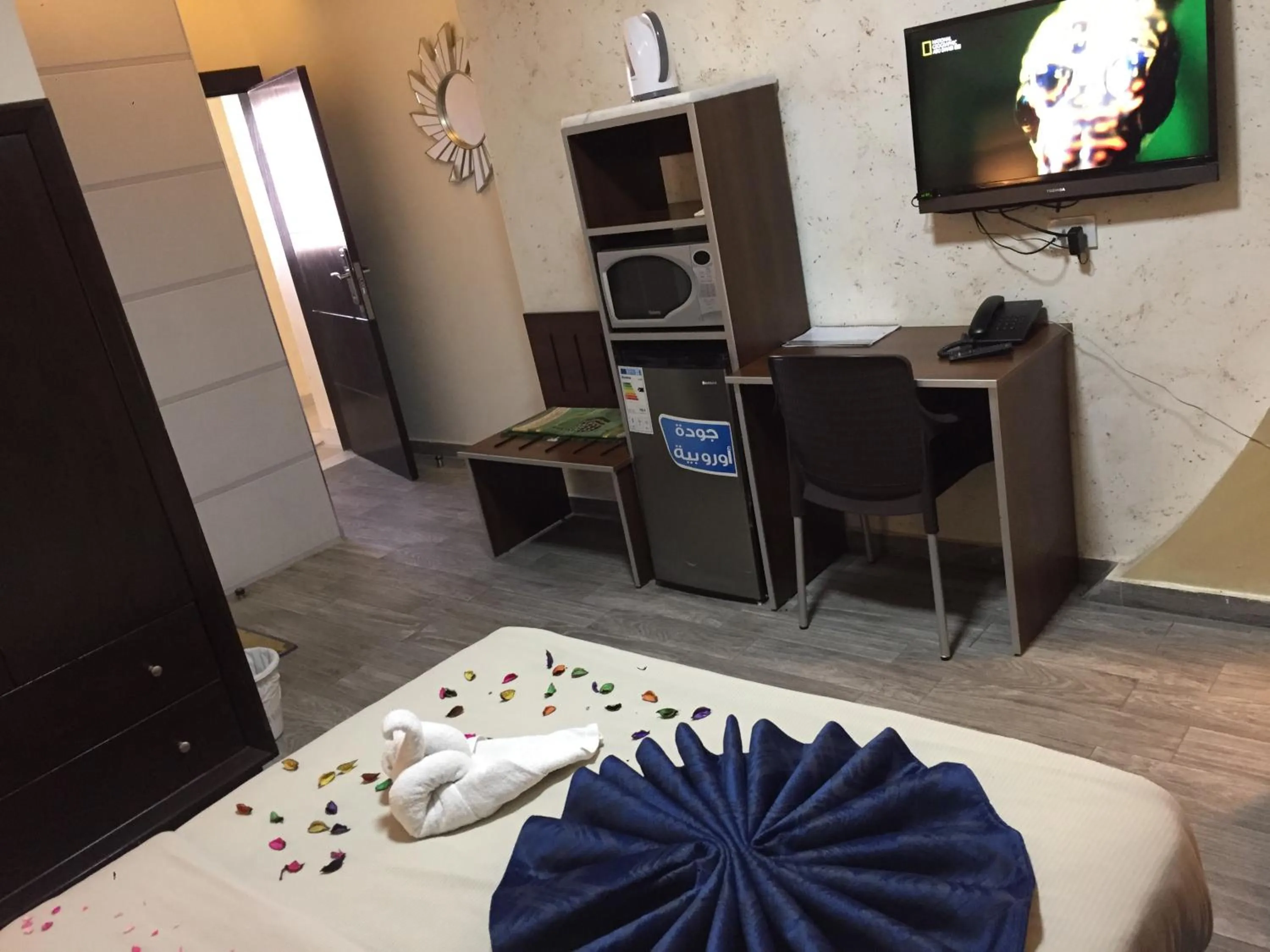 Bed in Uptown Hotel Apartment