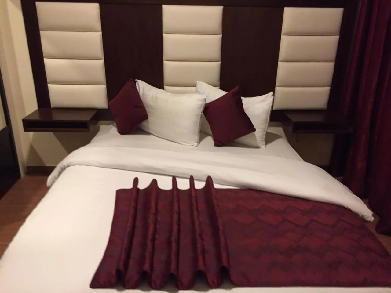 Bed in Uptown Hotel Apartment