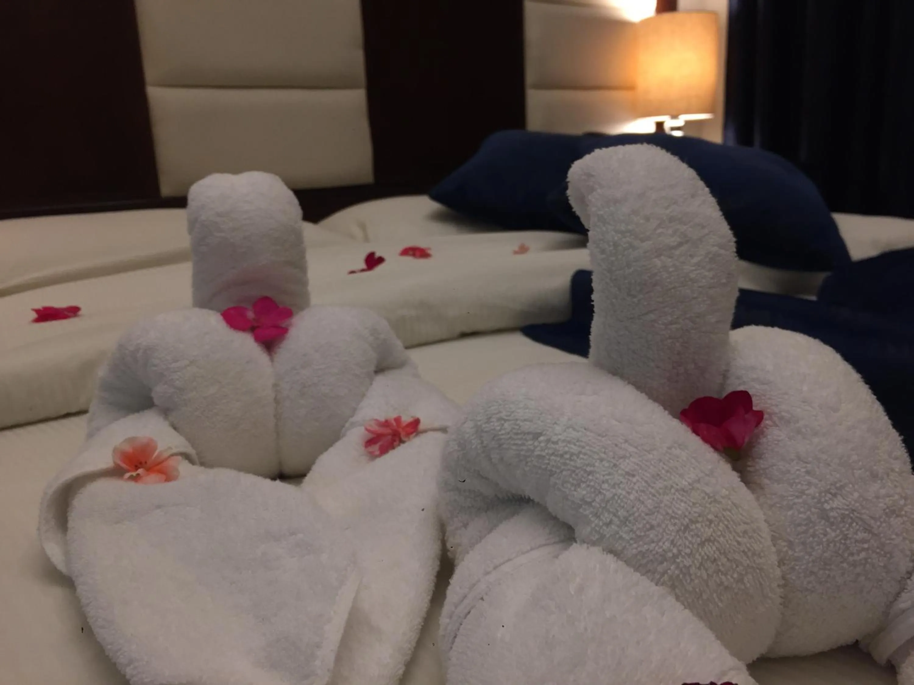 Bed in Uptown Hotel Apartment