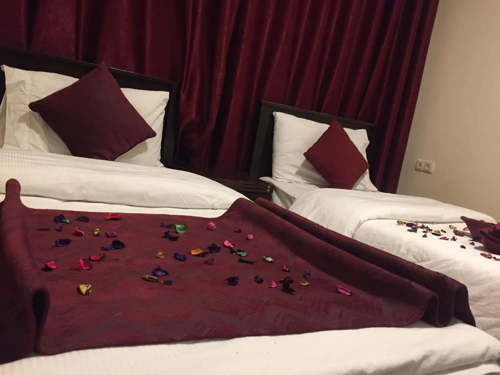 Bed in Uptown Hotel Apartment