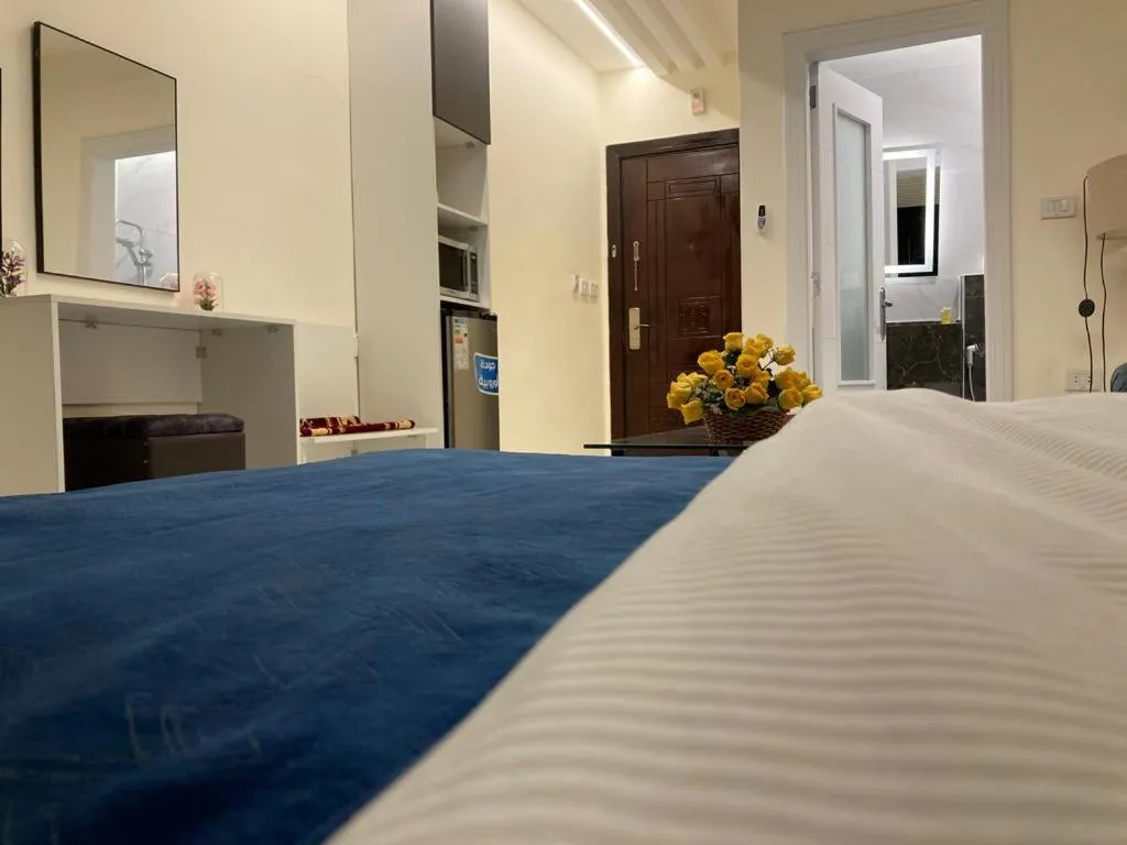 Bed in Uptown Hotel Apartment