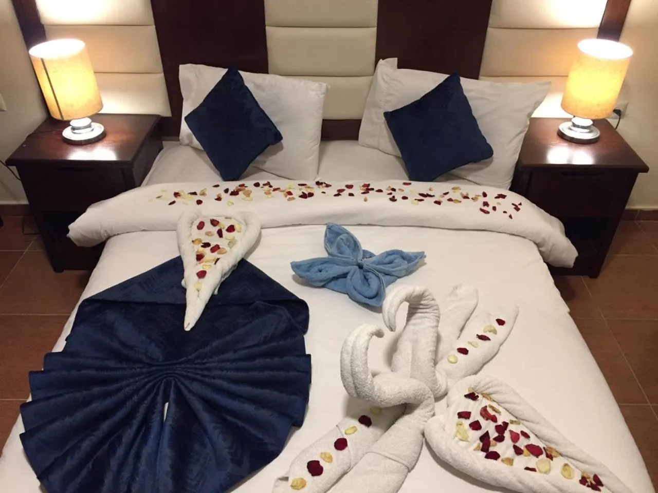 Bed in Uptown Hotel Apartment