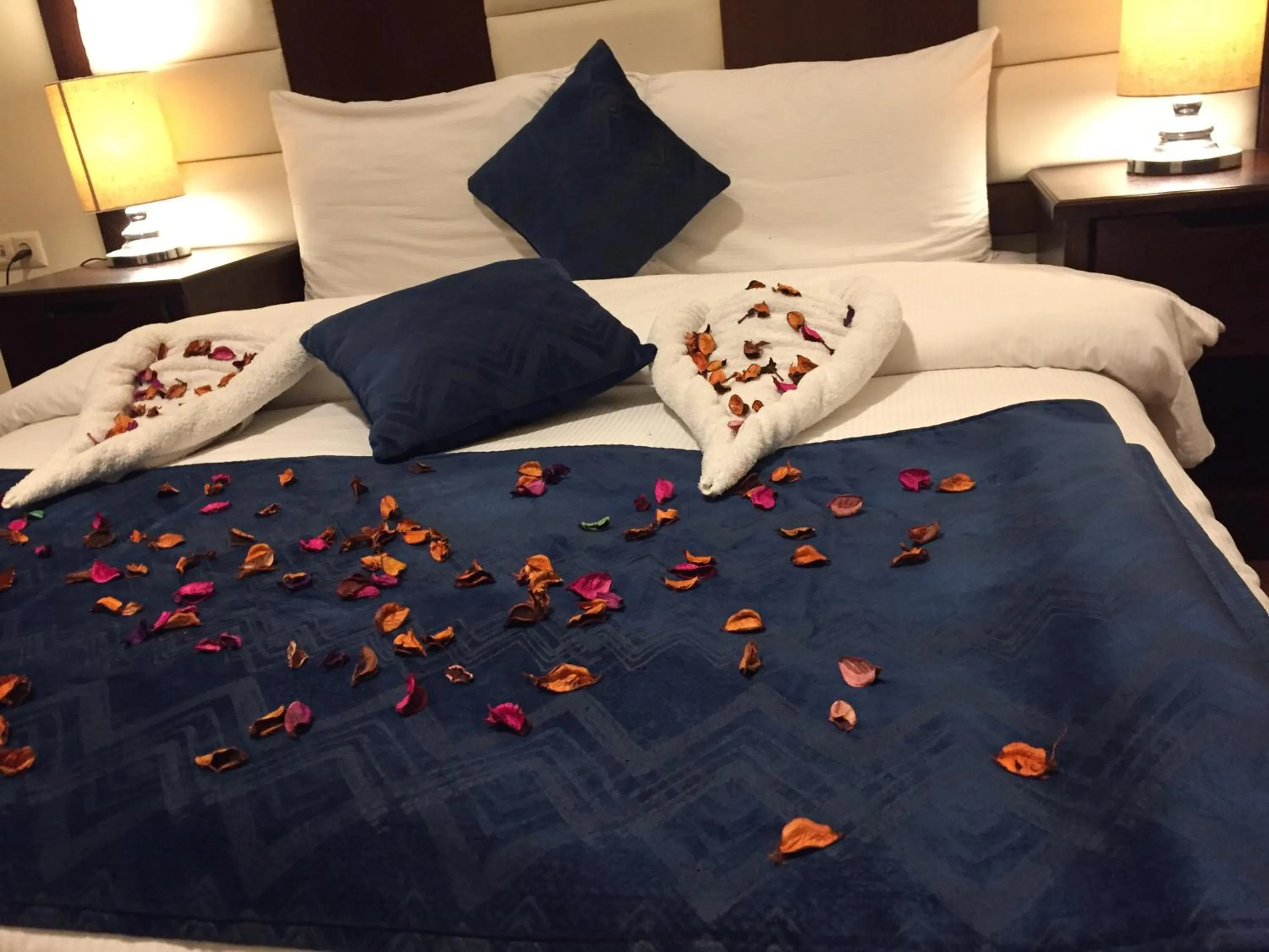 Bed in Uptown Hotel Apartment