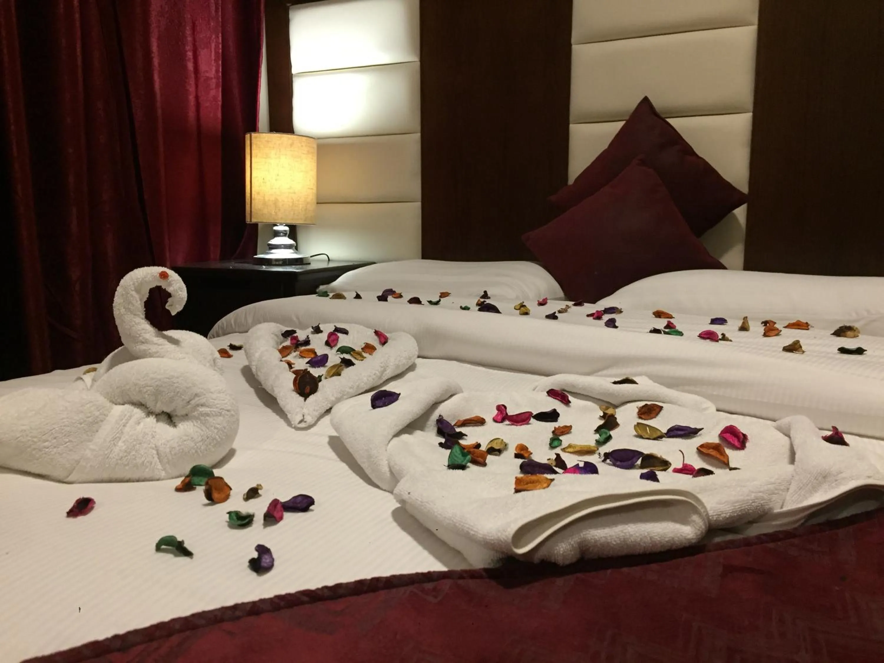 Bed in Uptown Hotel Apartment