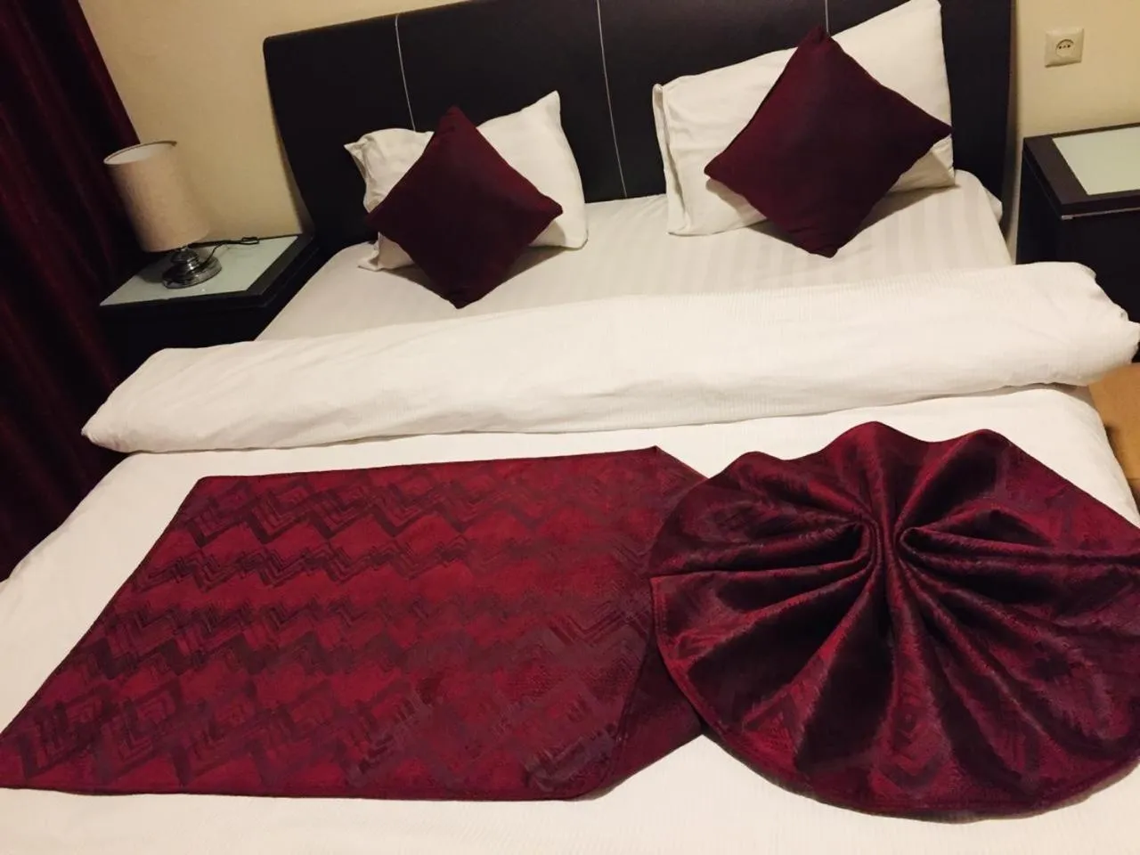 Bed in Uptown Hotel Apartment