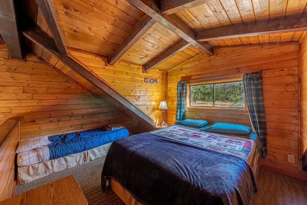 Bed in Forest Cabin 1 Hunters Blind