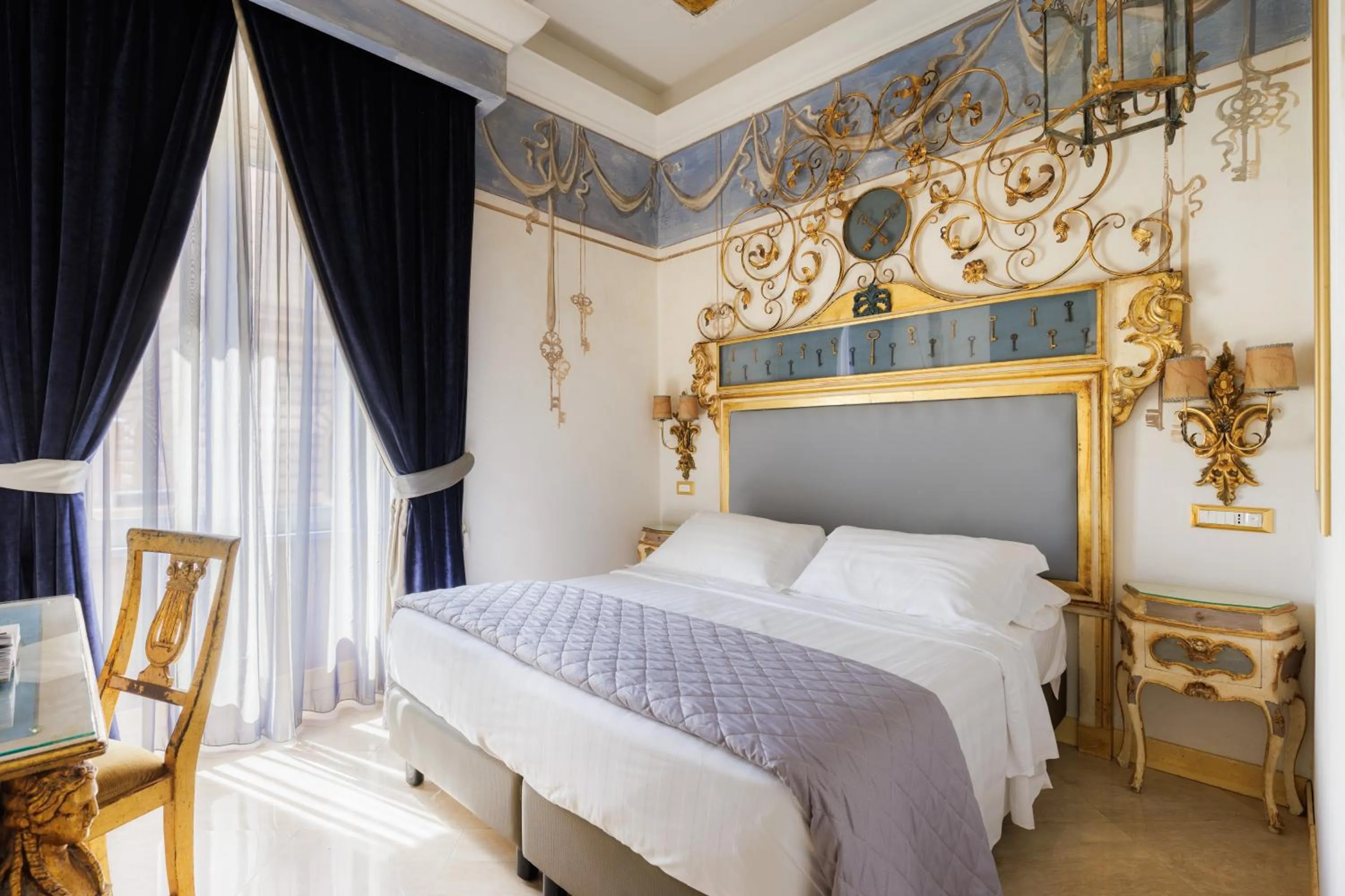 Bed in Romanico Palace Luxury Hotel & SPA