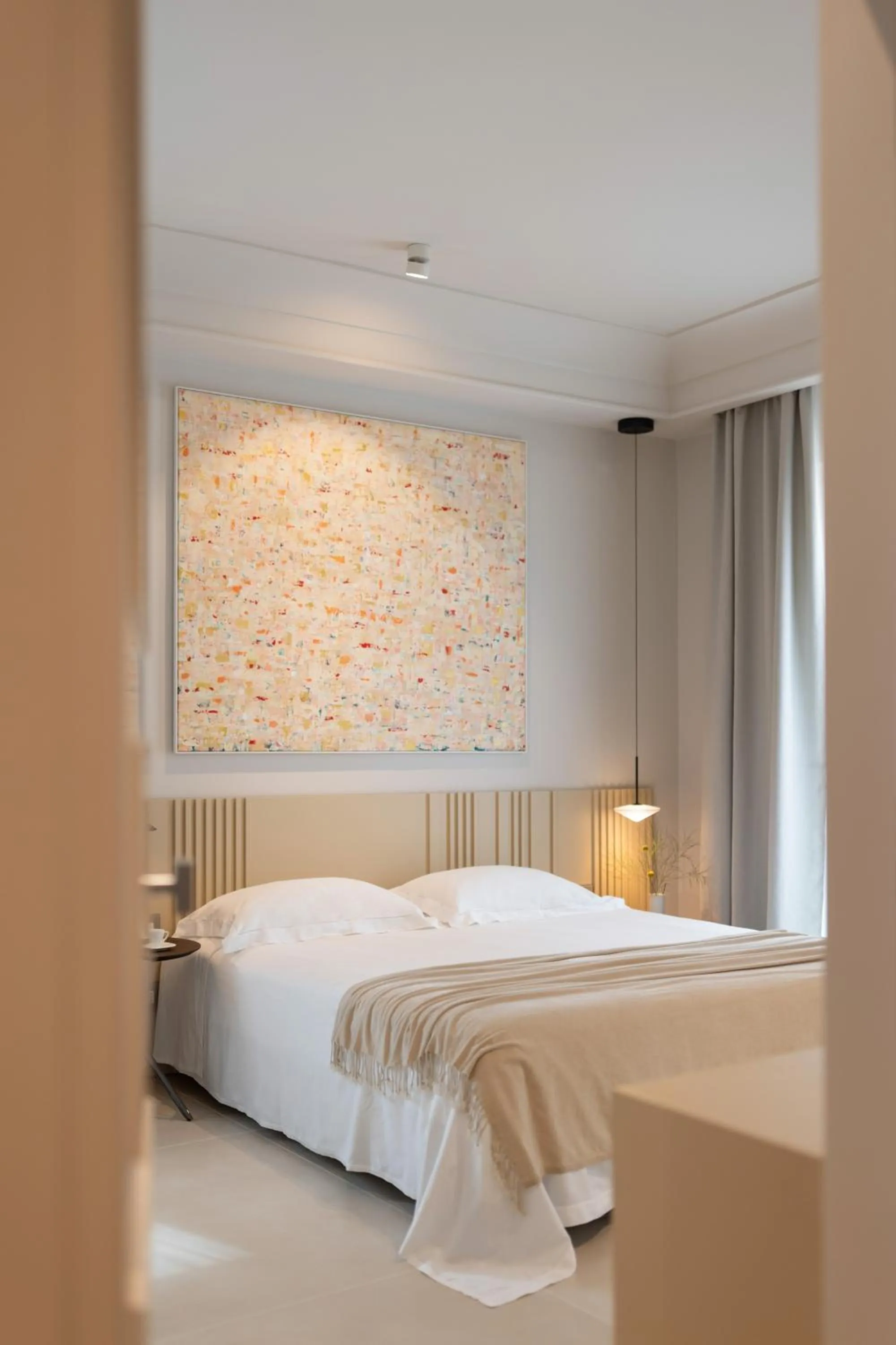 Bed in Taodomus Boutique Hotel