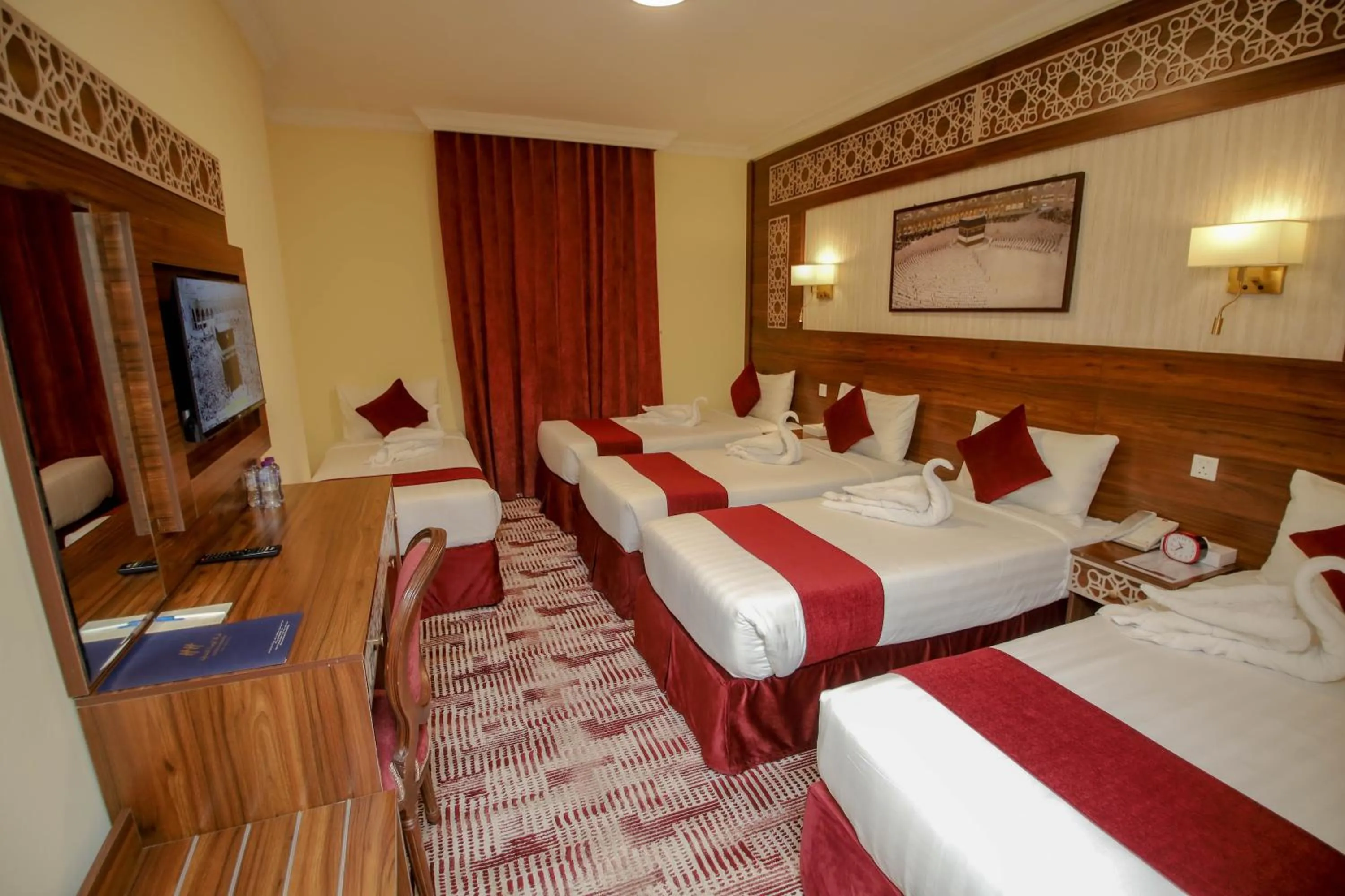 Bed in Abraj Al Tayseer Tuwa Hotel