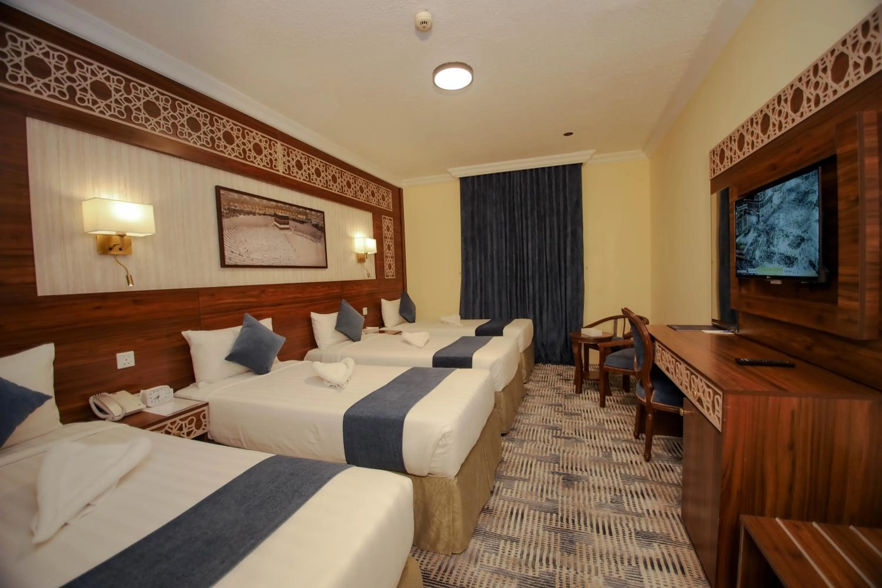 Bed in Abraj Al Tayseer Tuwa Hotel