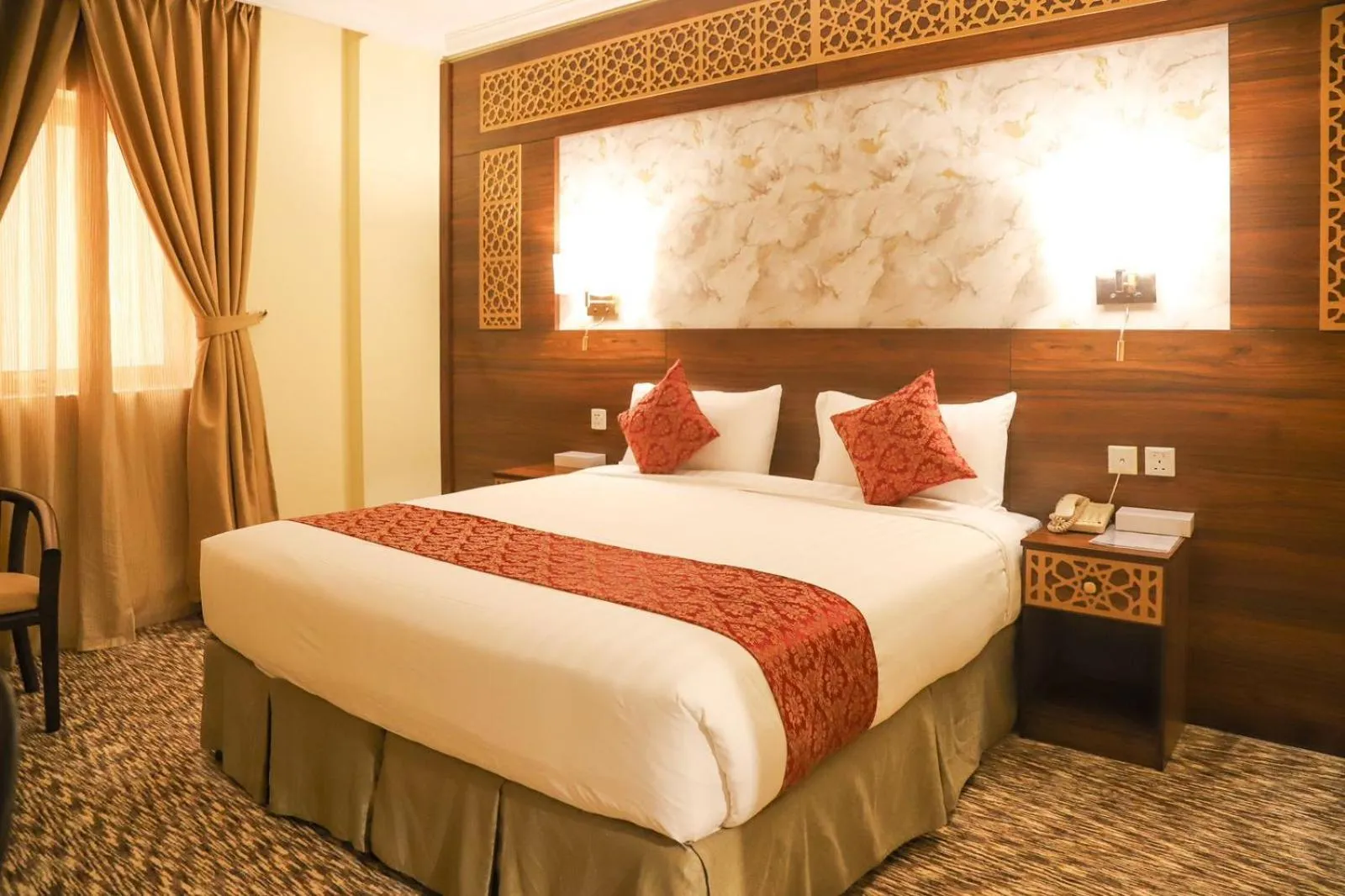 Bed in Abraj Al Tayseer Tuwa Hotel