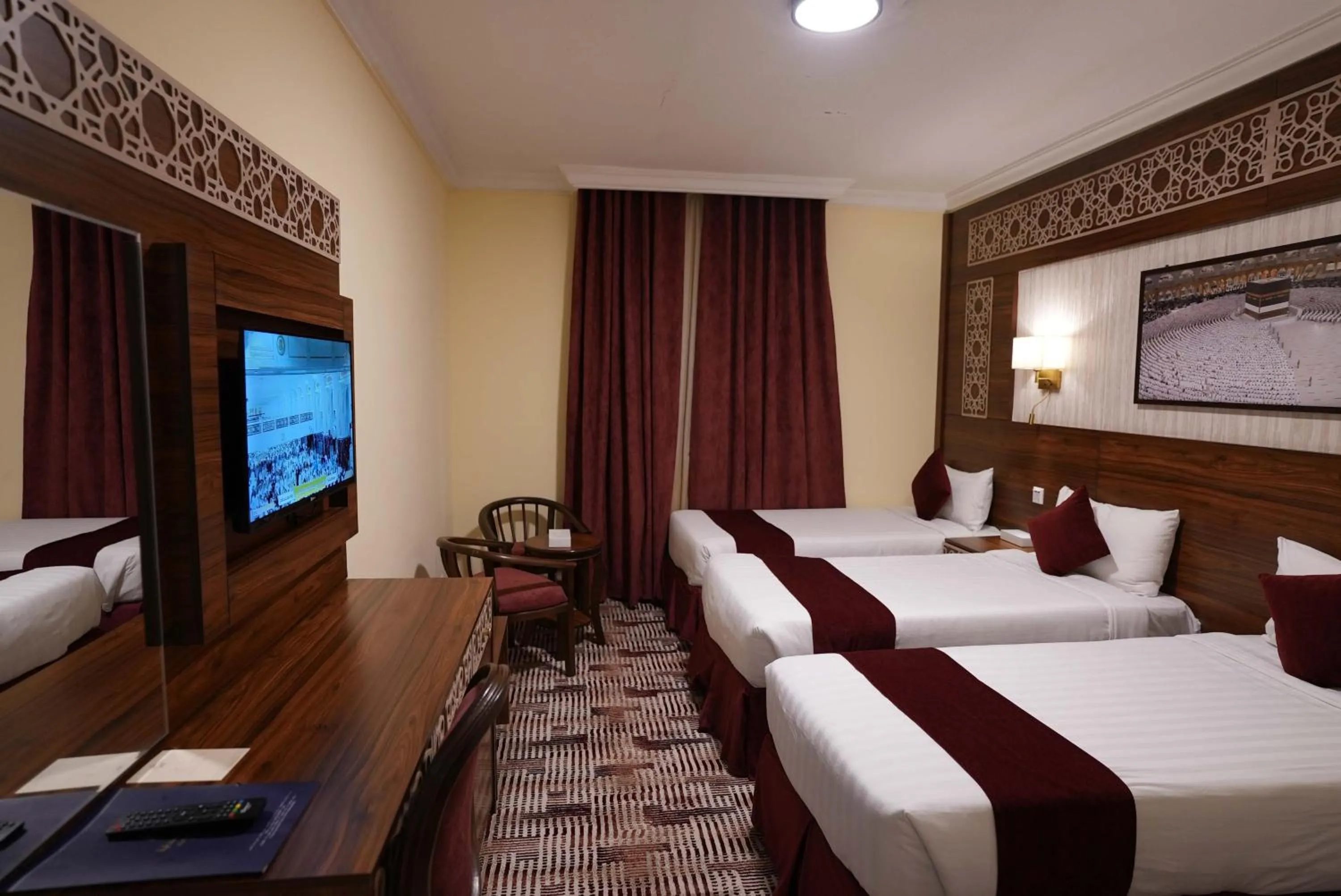 Bed in Abraj Al Tayseer Tuwa Hotel