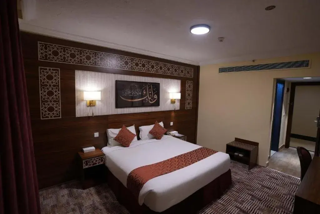 Bed in Abraj Al Tayseer Tuwa Hotel Bed in Abraj Al Tayseer Tuwa Hotel