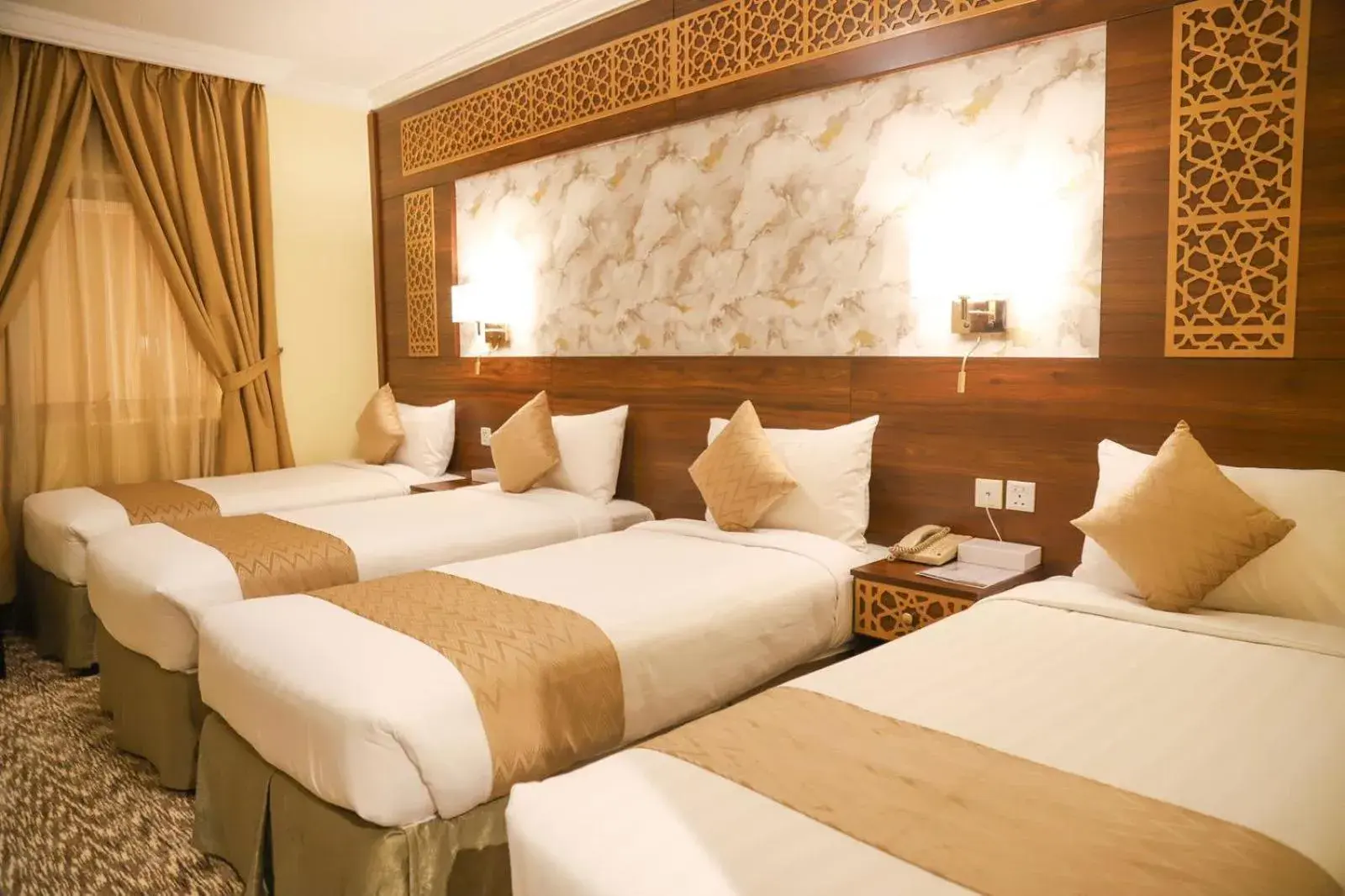Bed in Abraj Al Tayseer Tuwa Hotel Bed in Abraj Al Tayseer Tuwa Hotel