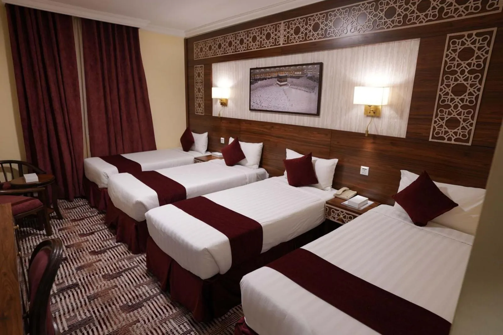 Bed in Abraj Al Tayseer Tuwa Hotel