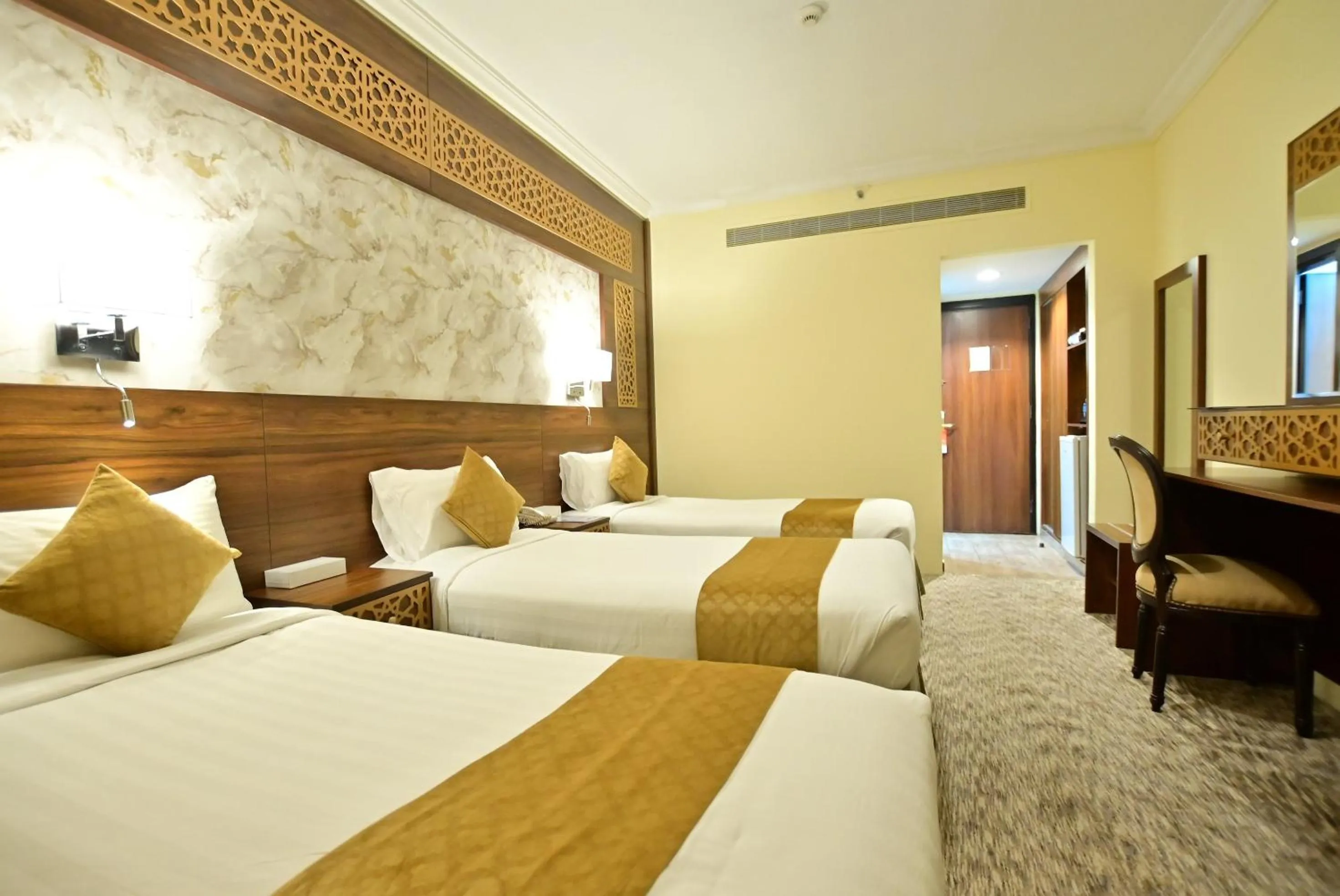 Photo of the whole room, Bed in Abraj Al Tayseer Tuwa Hotel