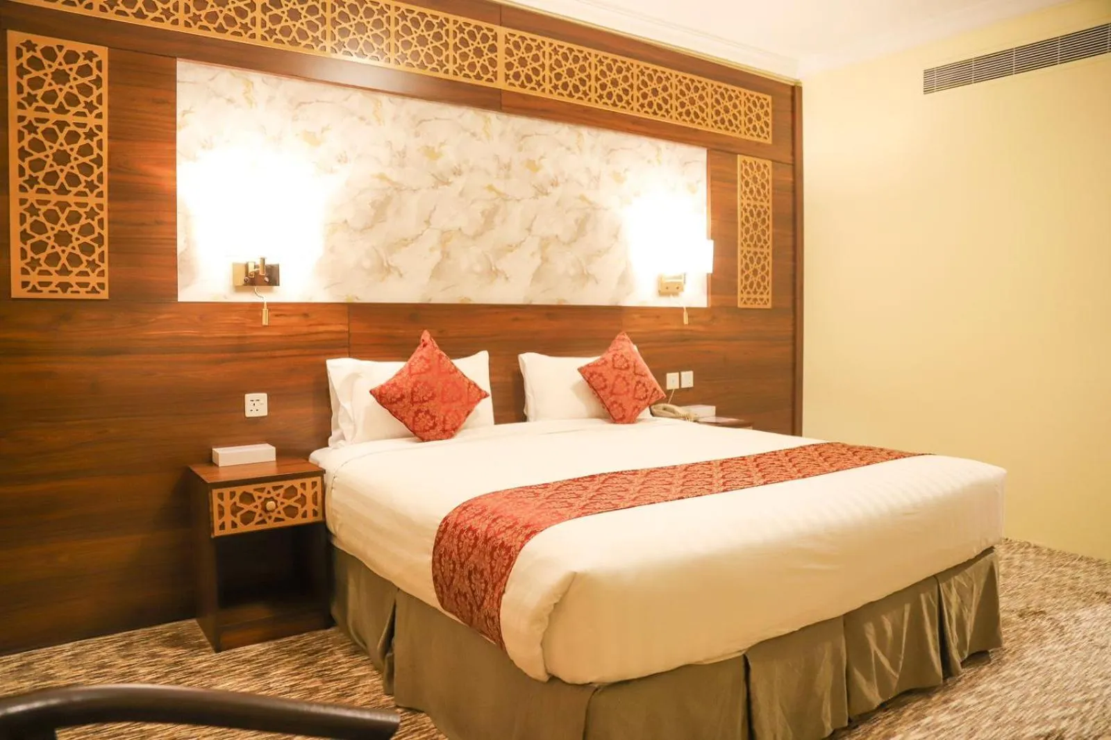 Bed in Abraj Al Tayseer Tuwa Hotel