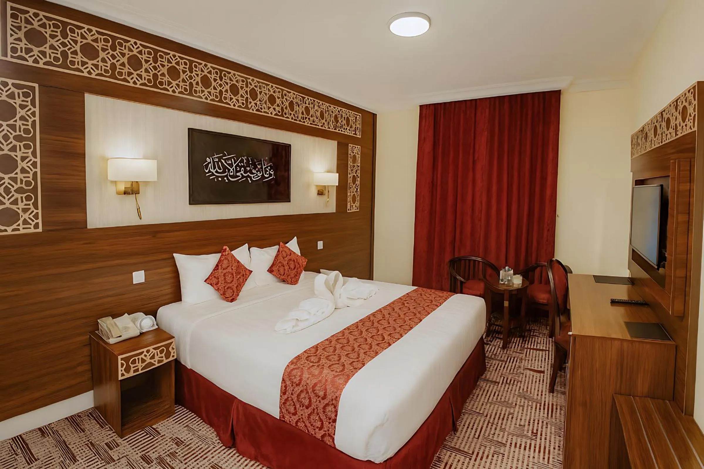 Bed in Abraj Al Tayseer Tuwa Hotel
