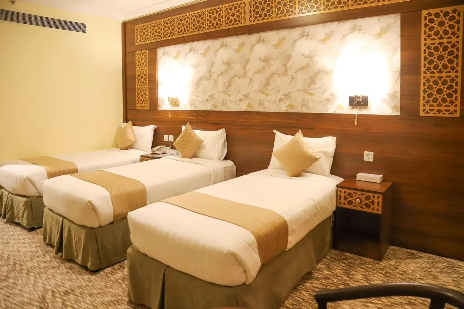 Bed in Abraj Al Tayseer Tuwa Hotel Bed in Abraj Al Tayseer Tuwa Hotel