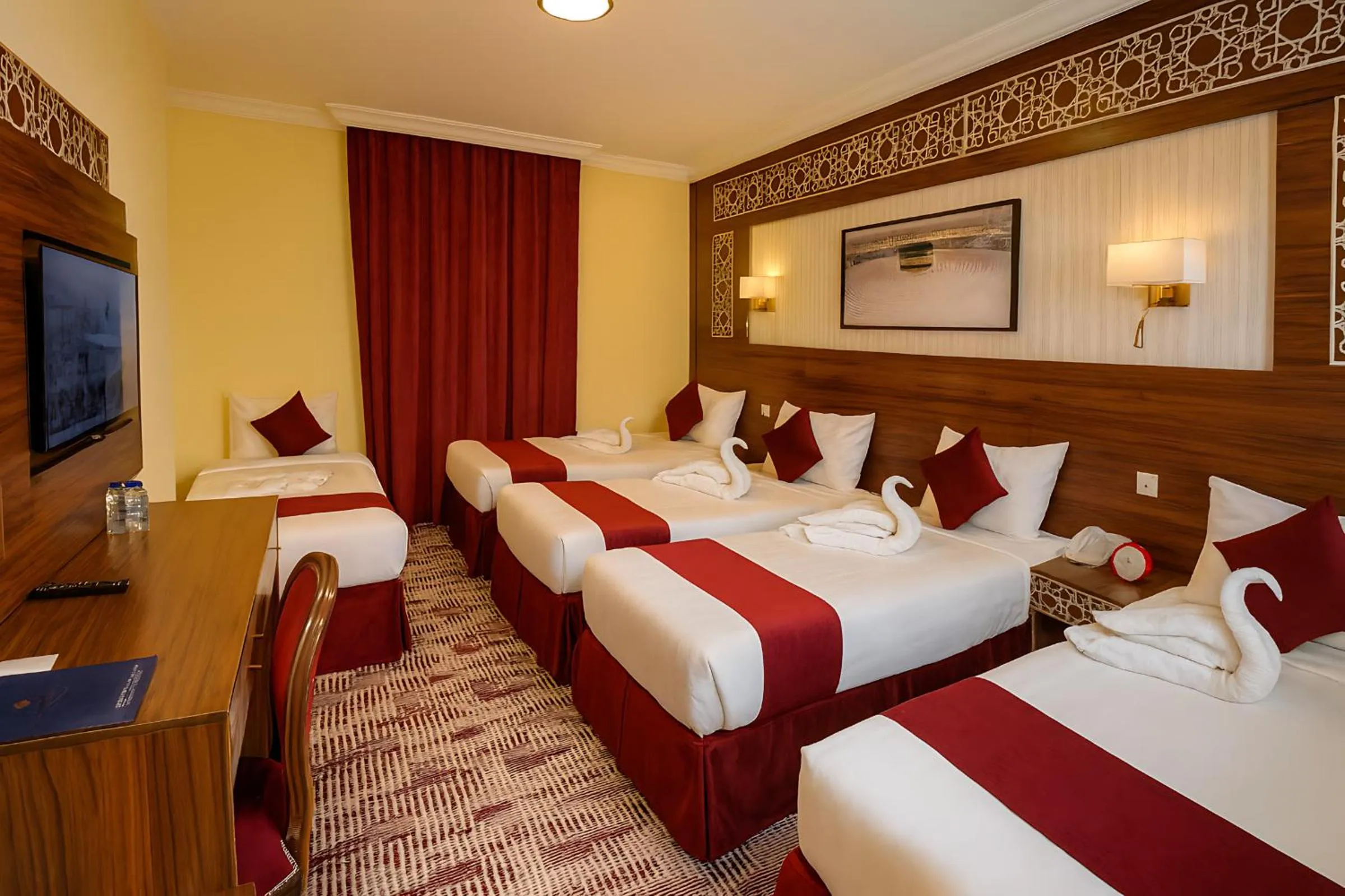 Bed in Abraj Al Tayseer Tuwa Hotel