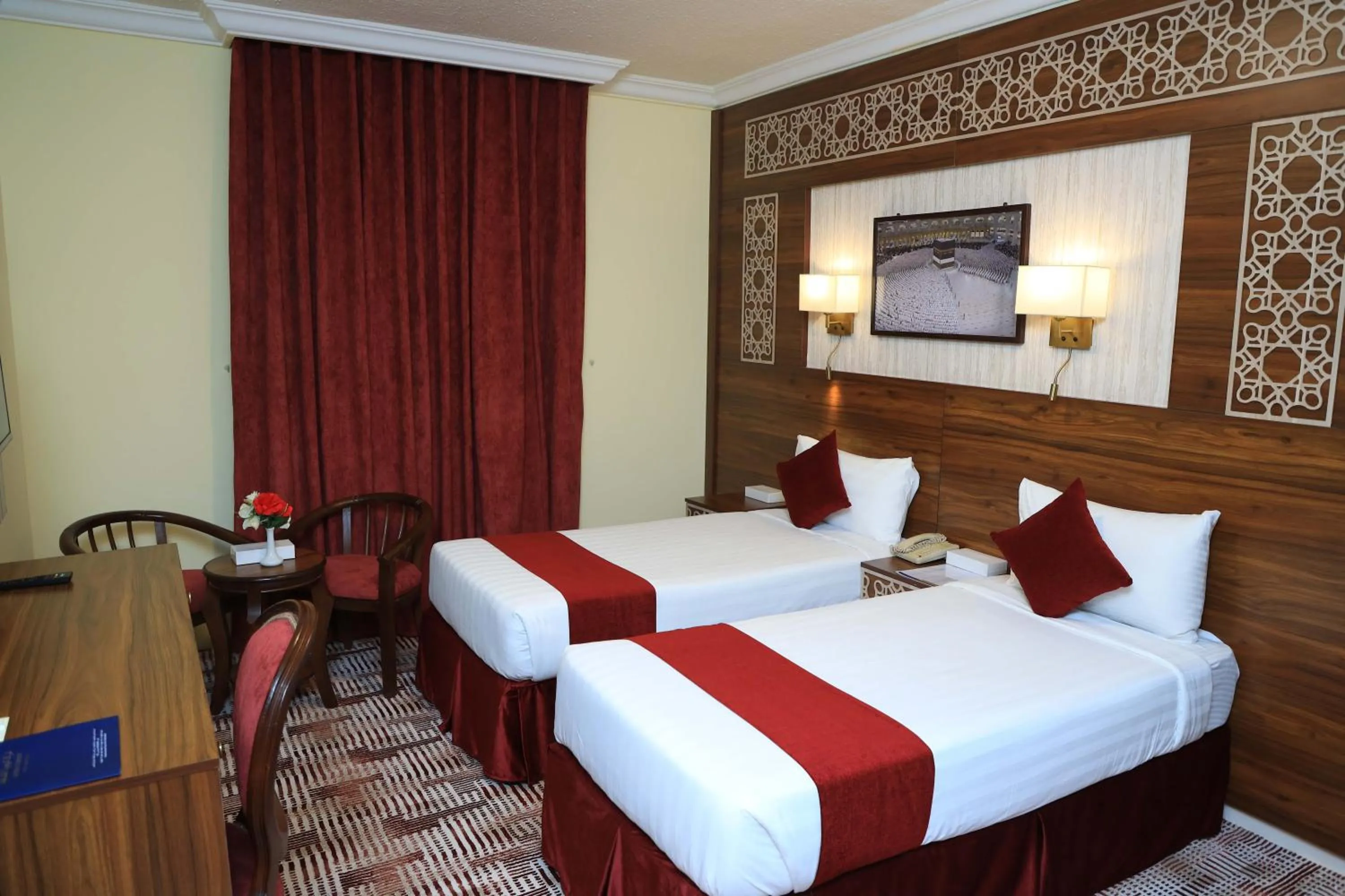 Bed in Abraj Al Tayseer Tuwa Hotel