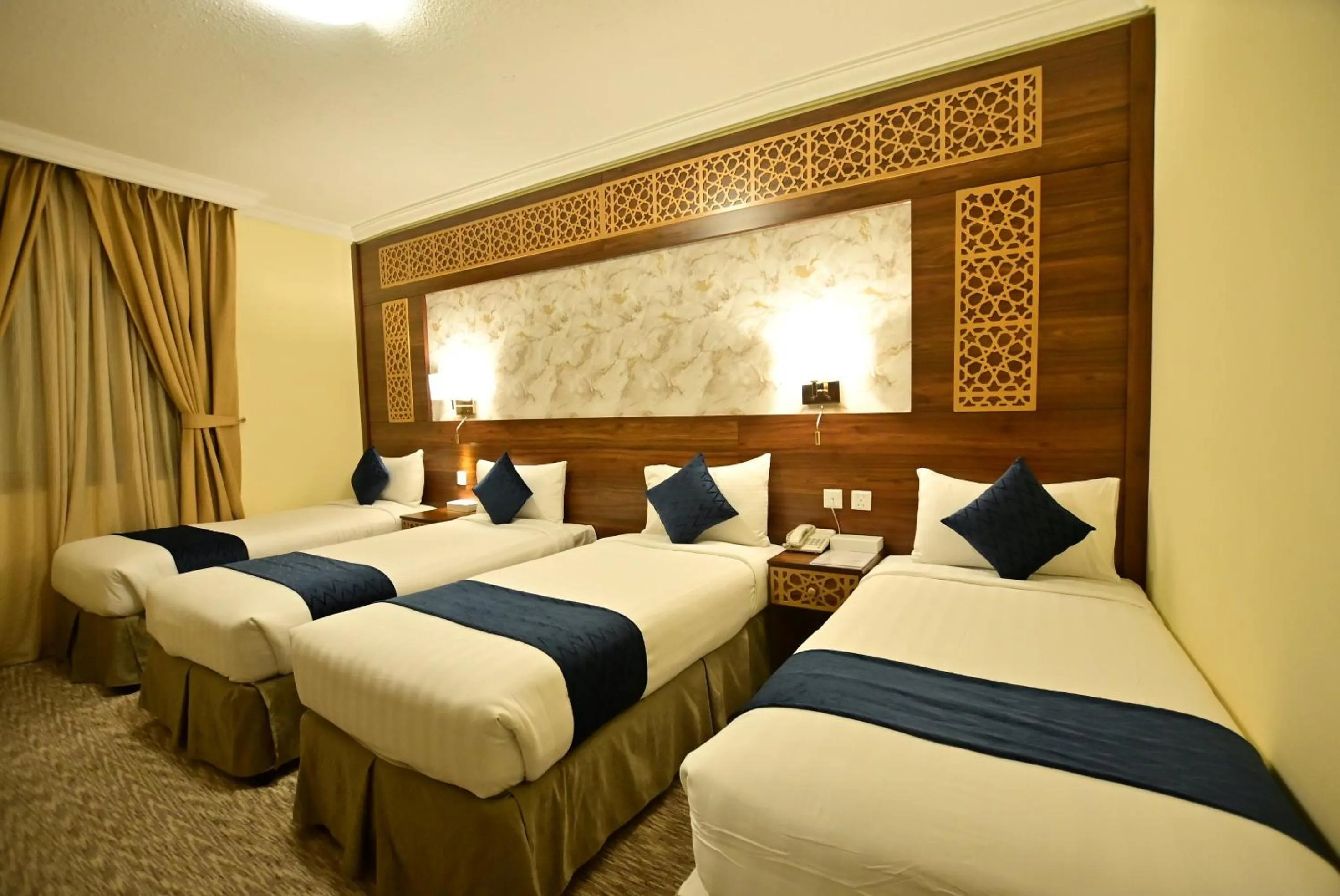 Photo of the whole room, Bed in Abraj Al Tayseer Tuwa Hotel