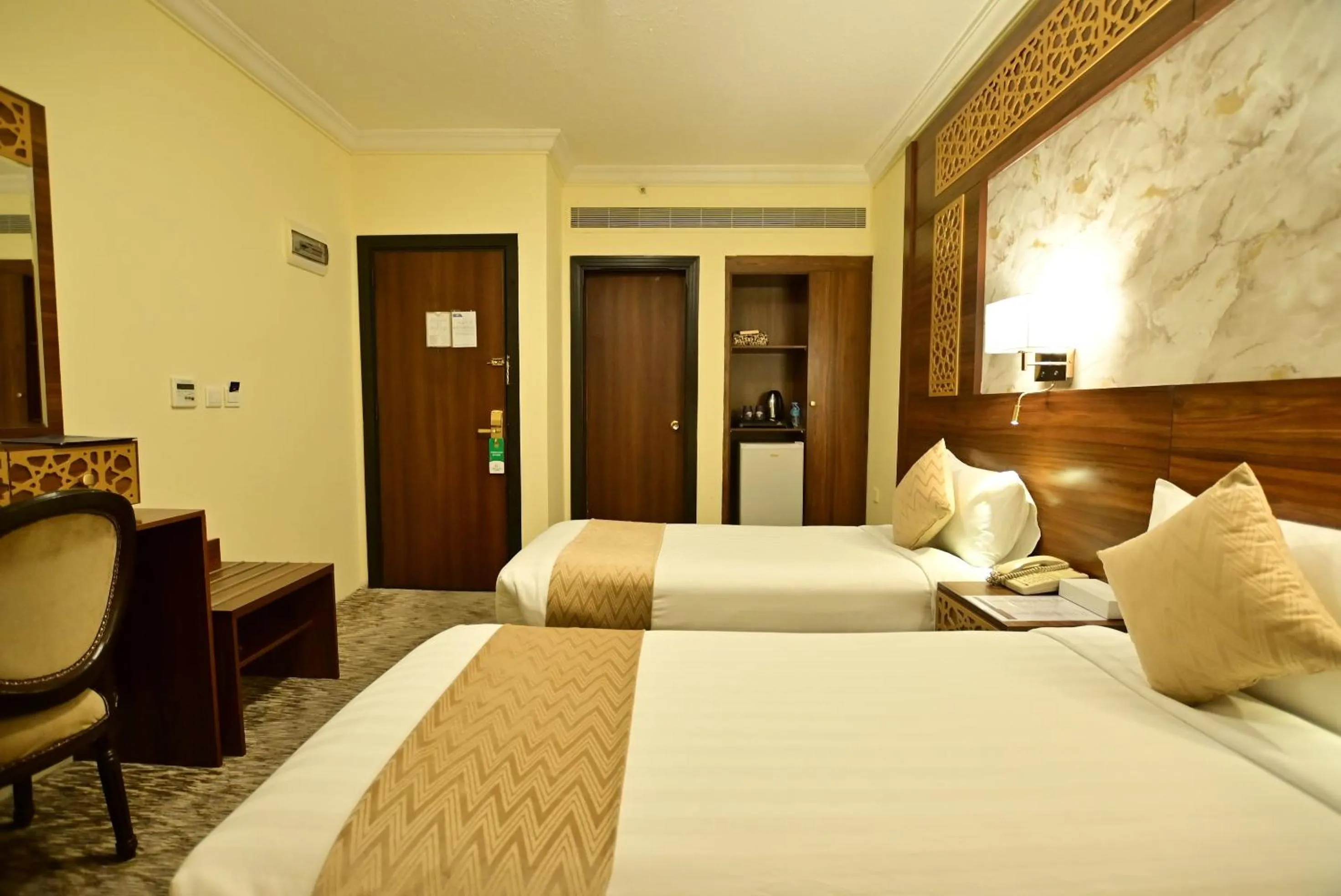 Photo of the whole room, Bed in Abraj Al Tayseer Tuwa Hotel
